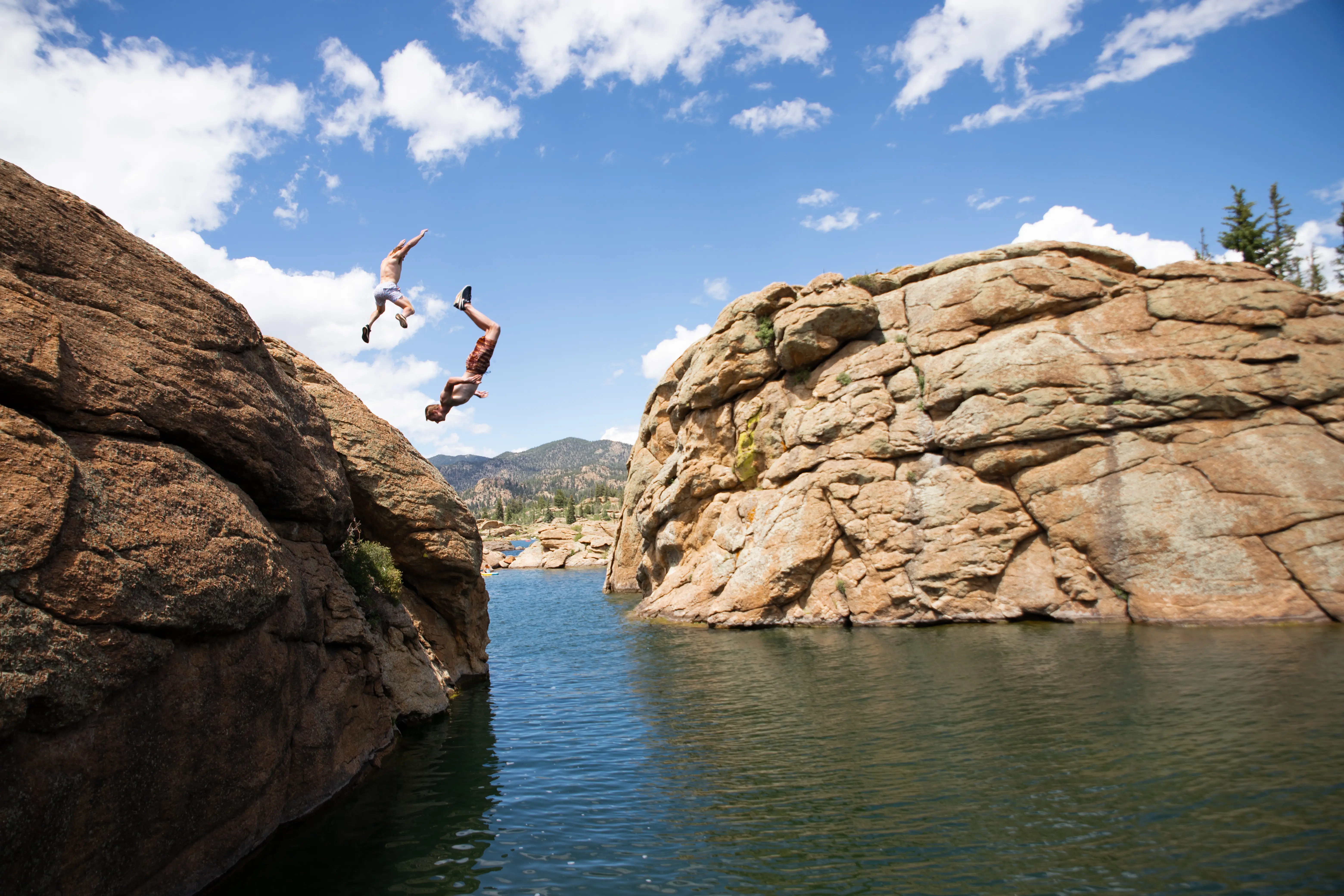 Streetside billboard with flyposters of the Batch.Works brand and illustrations