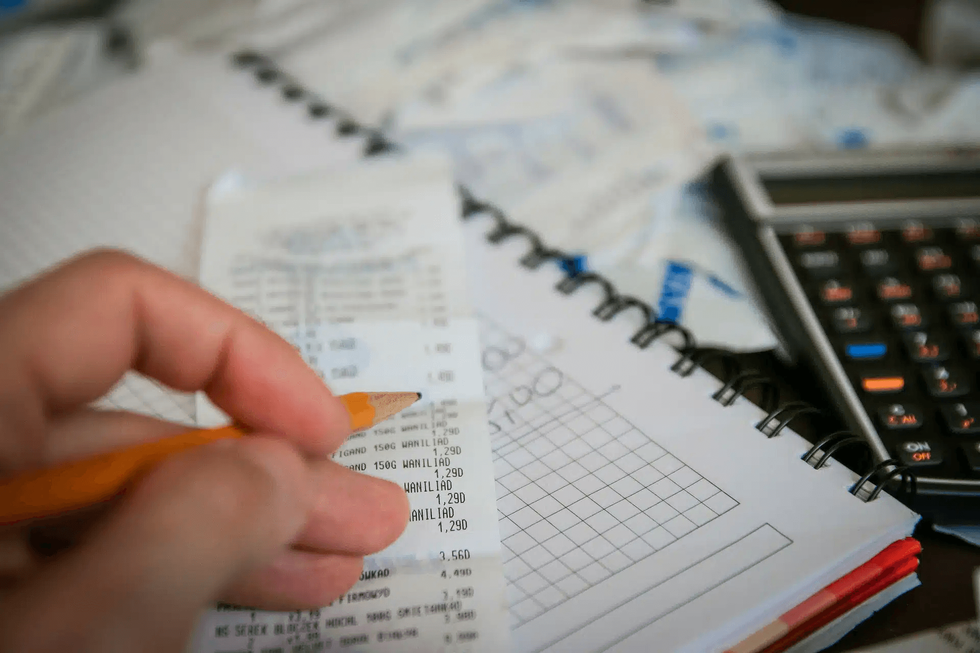 Person checking receipts - Close Corporation Taxation