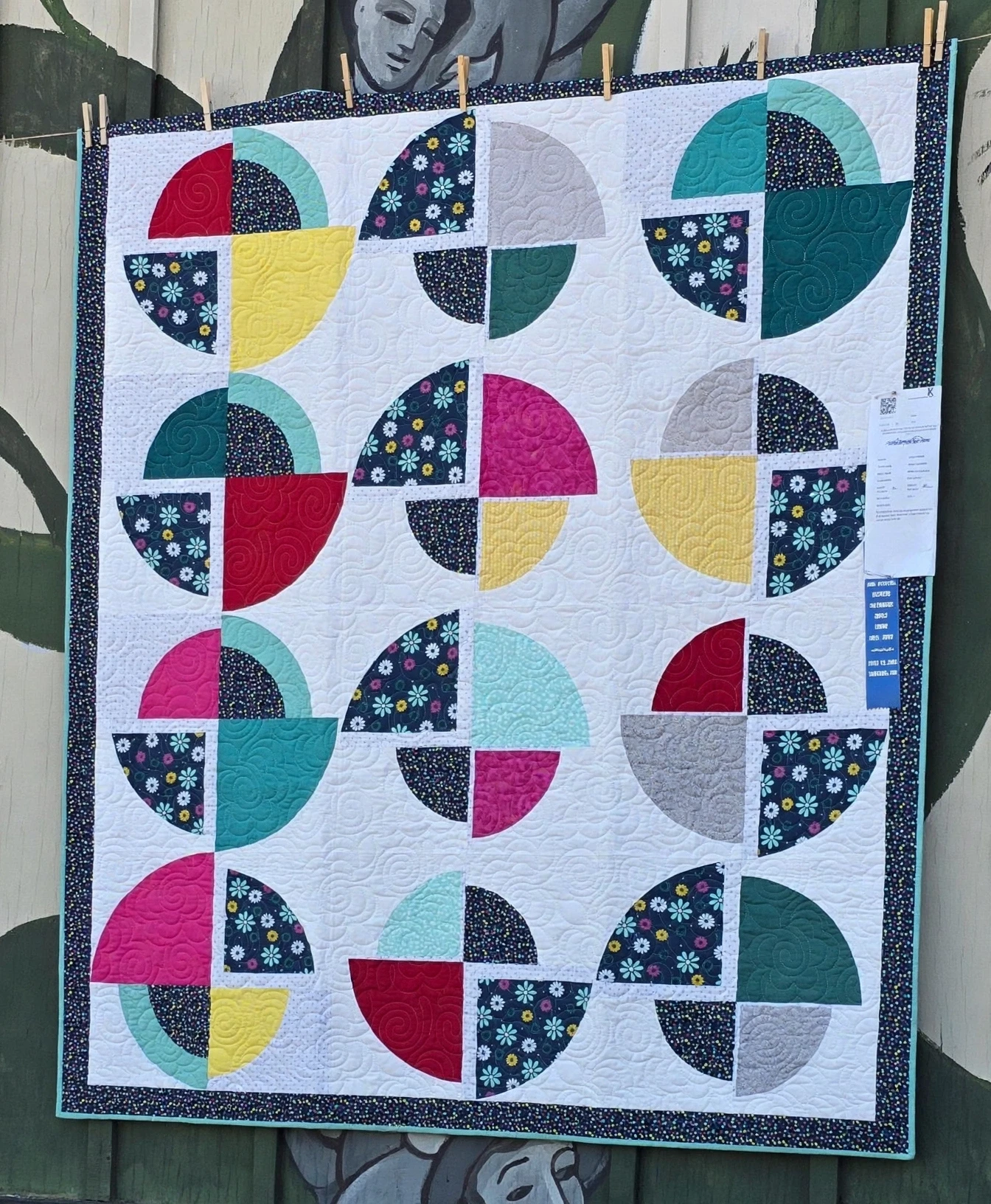 Displayed quilt by PT Quilters