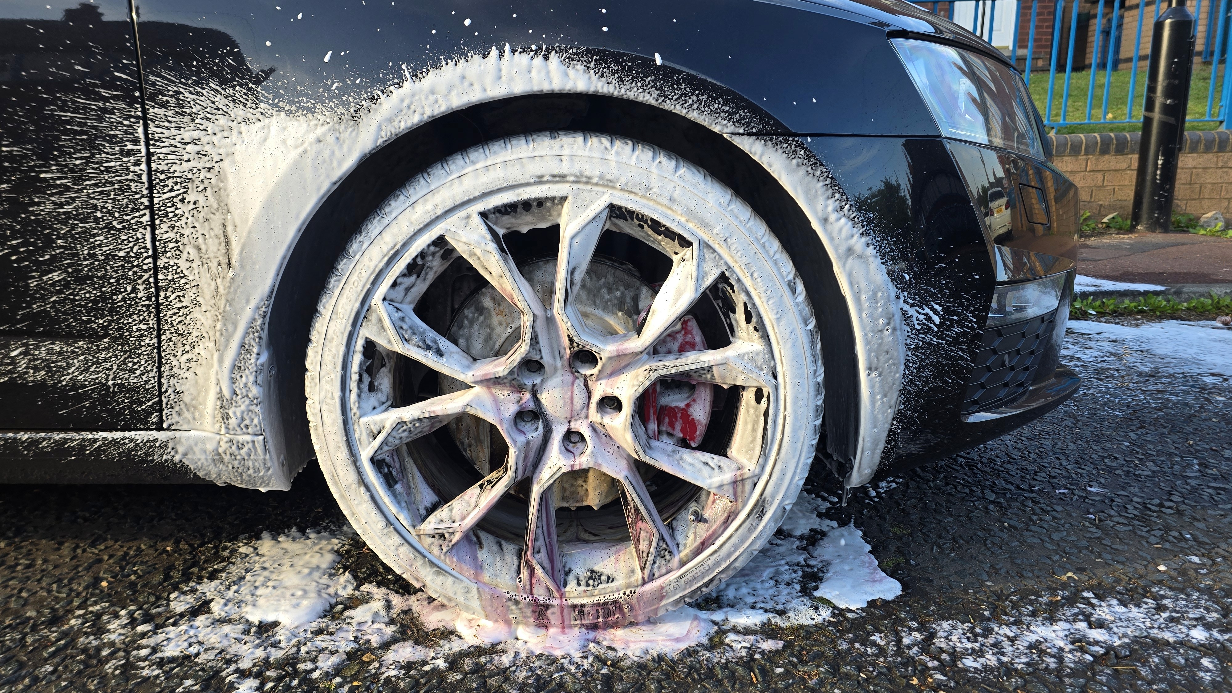 Vehicle exterior prepared during a detailed paint-safe process