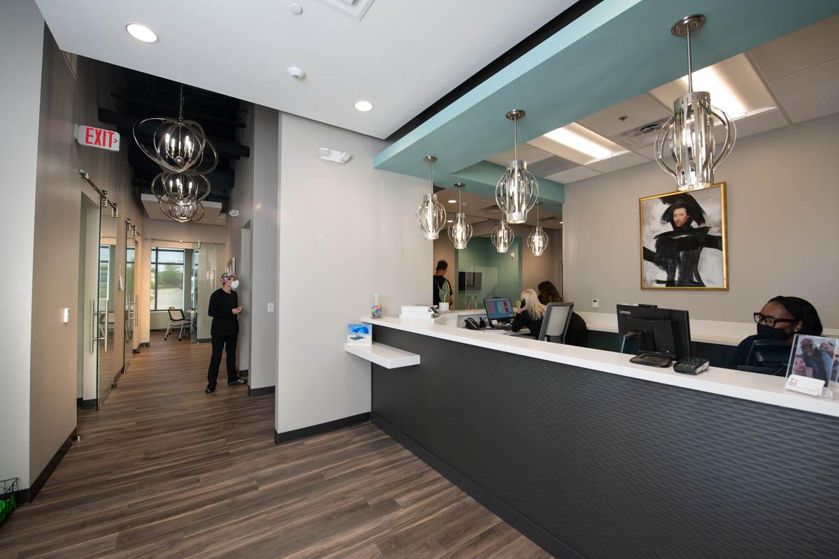 a living room with a couch a table and chairs