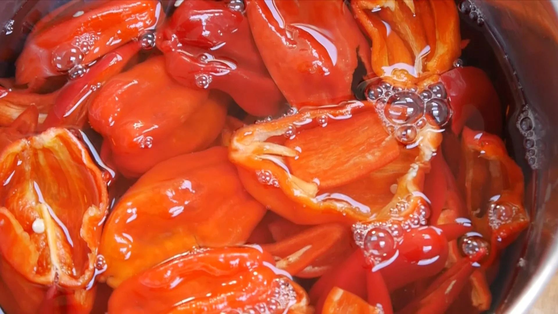 Peppers cooking in water