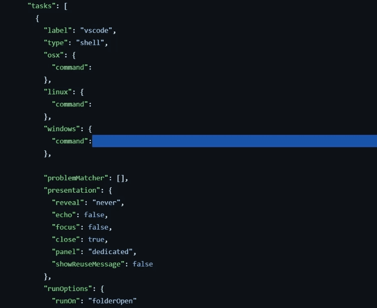Command hidden via long whitespace in .vscode/tasks.json