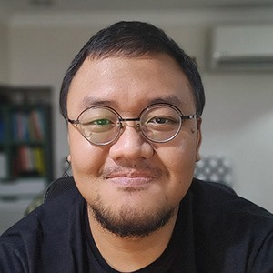 Desk with keyboard and brown chair