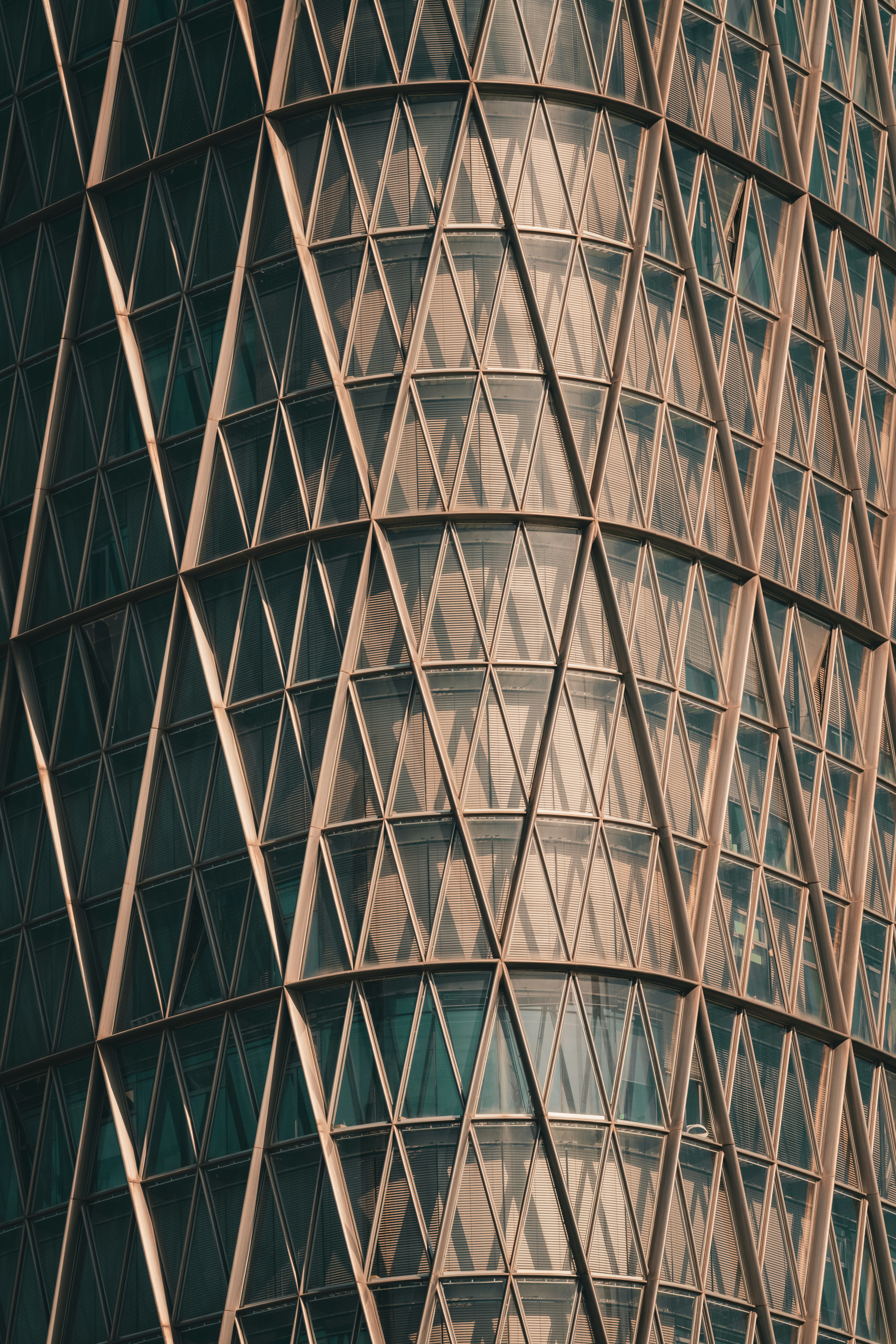 Modern skyscraper with a geometric glass facade