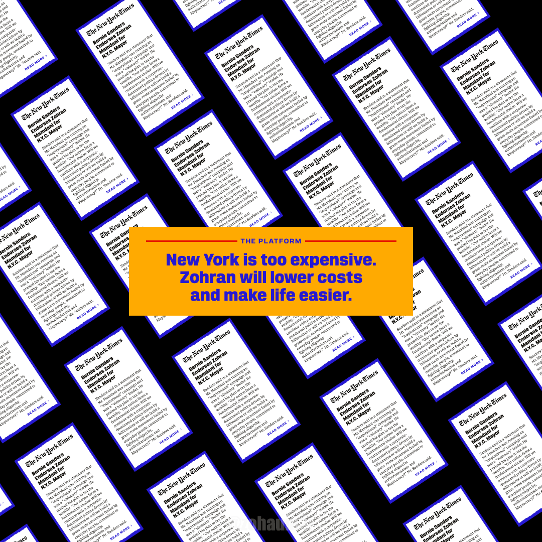 a group of people walking on a sidewalk