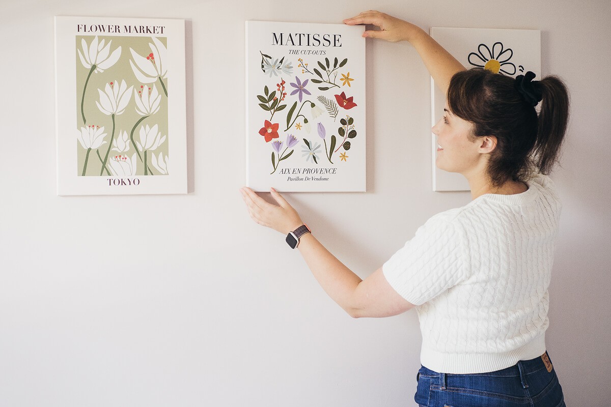 Aniko Rucz preparing interior details to create a guest-ready short-term rental home