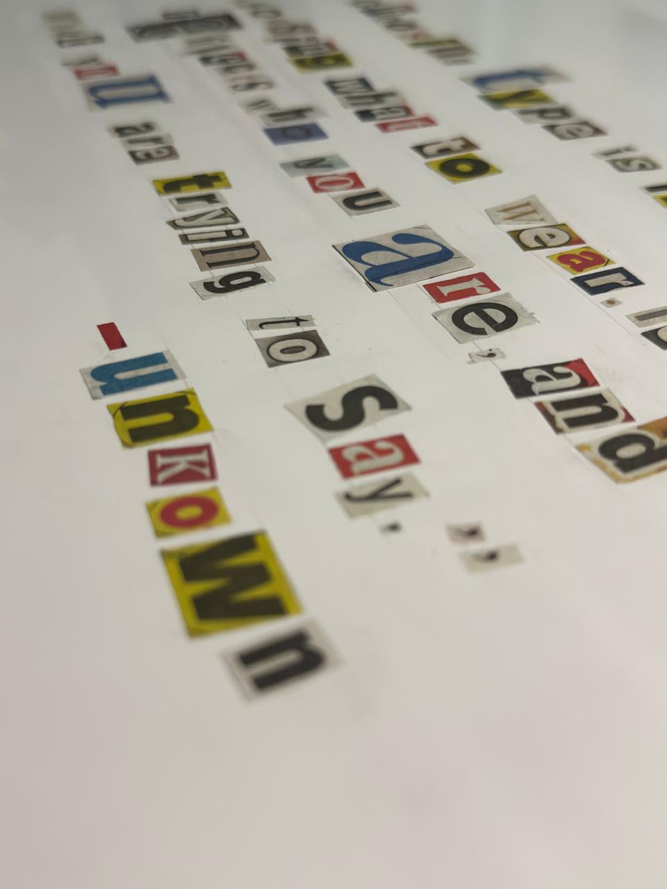 Ransom letter typeface. Made by cutting out individual letters from newspapers to form a quote.