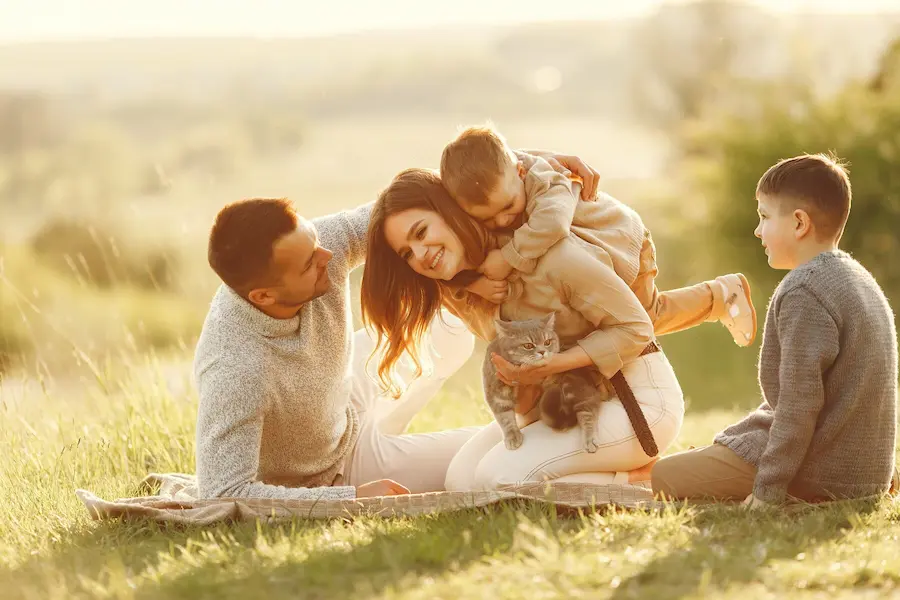 happy family photo with two small kids protect secure insurance policy