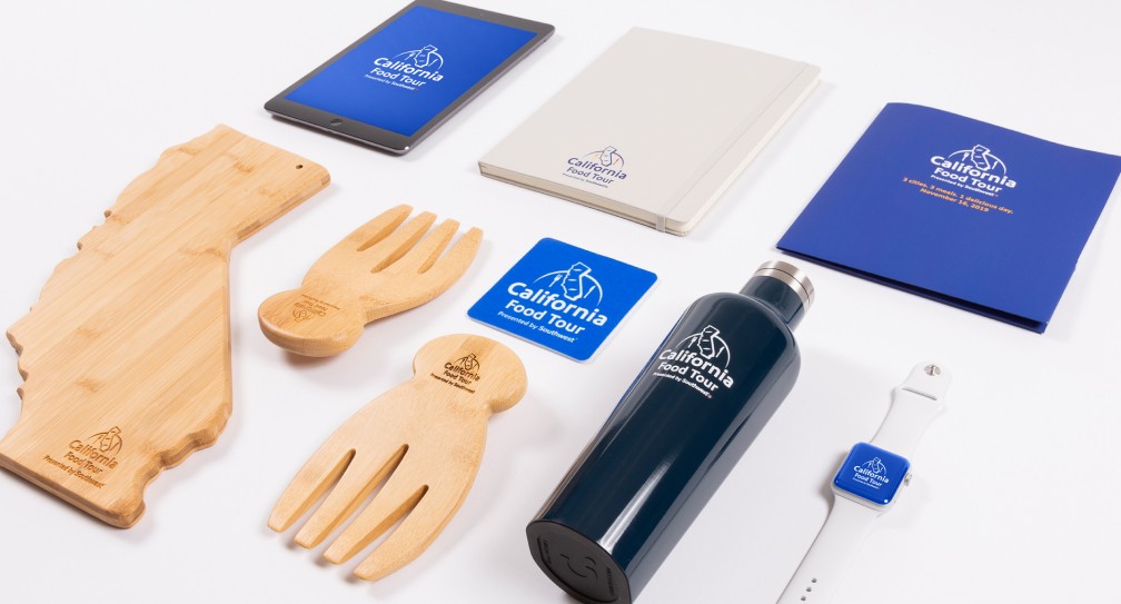 Image of elements making up the prize package such as cutting board, tablet and apple watch