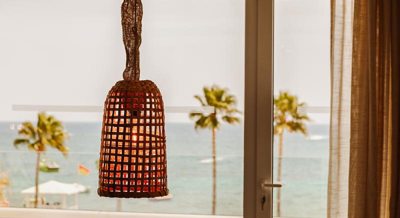 Private balcony view of the Mediterranean Sea from a luxury Moroccan-inspired beach suite by topos design studio