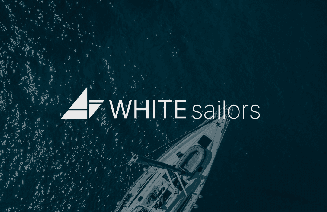 Logo on a sea background with a yacht.