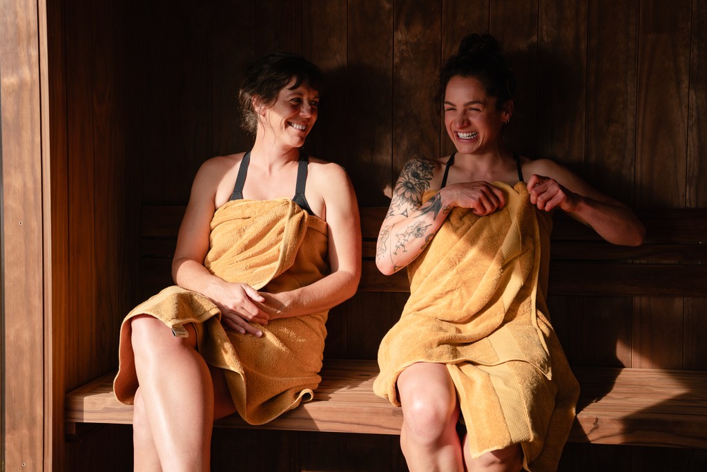 Women laughing in sauna