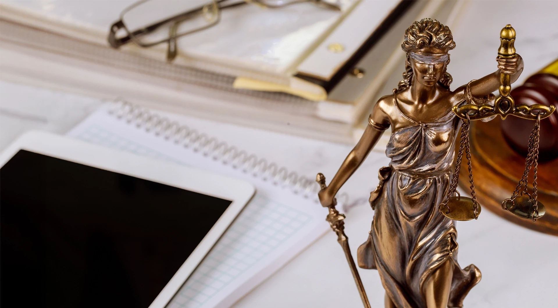 Statue of Lady Justice symbolizing Noah Schwinghamer's commitment to fairness and advocacy