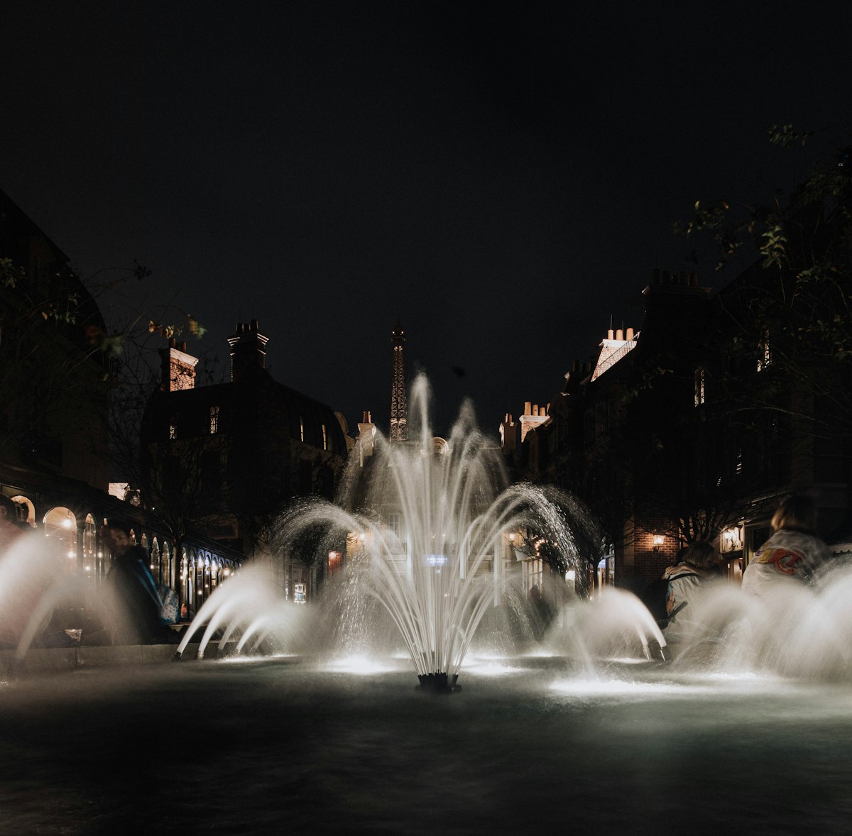 Garden Fountain for Sleep — a water fountain in the middle of a city at night