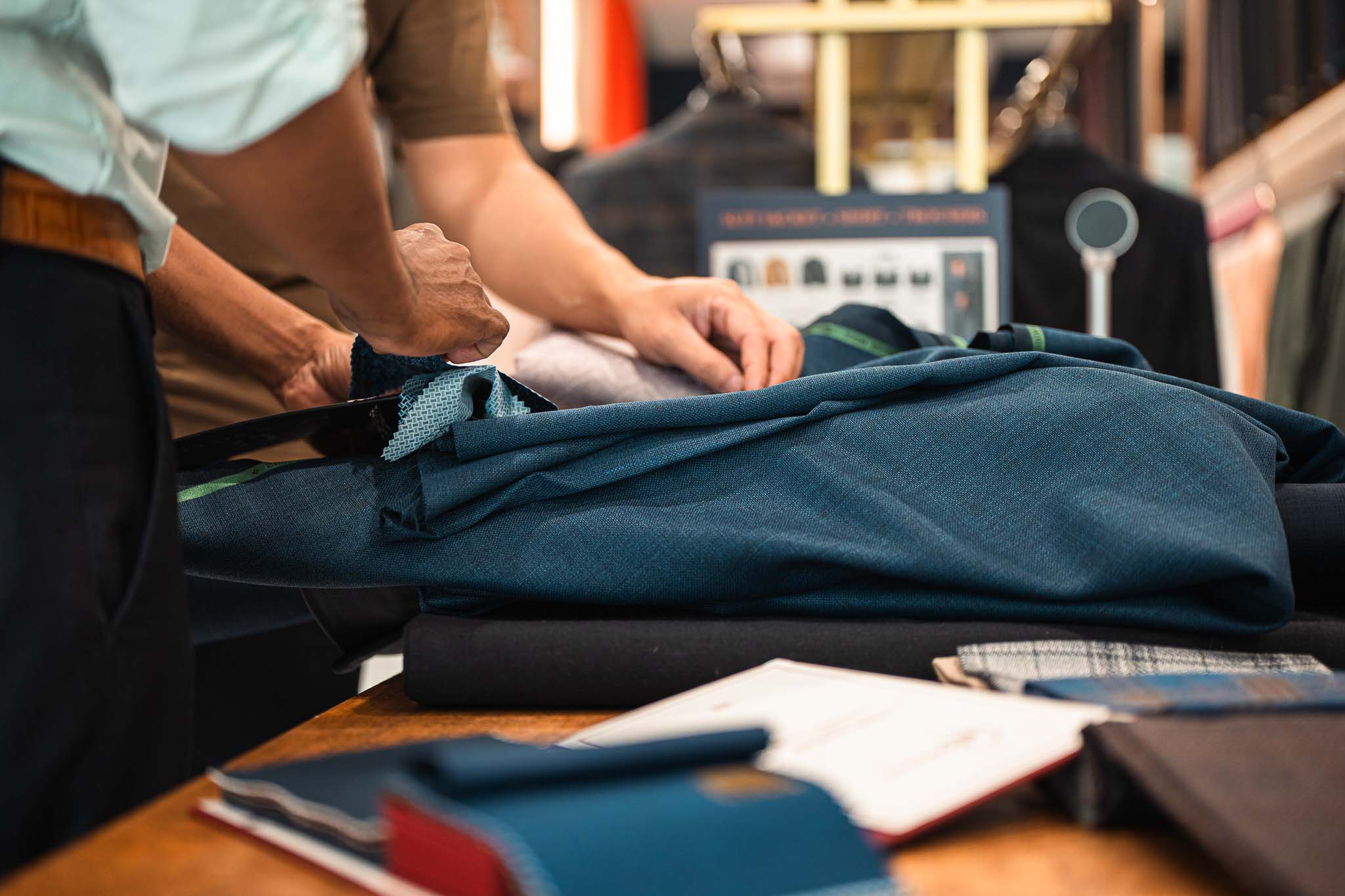man in white dress shirt holding black microphone