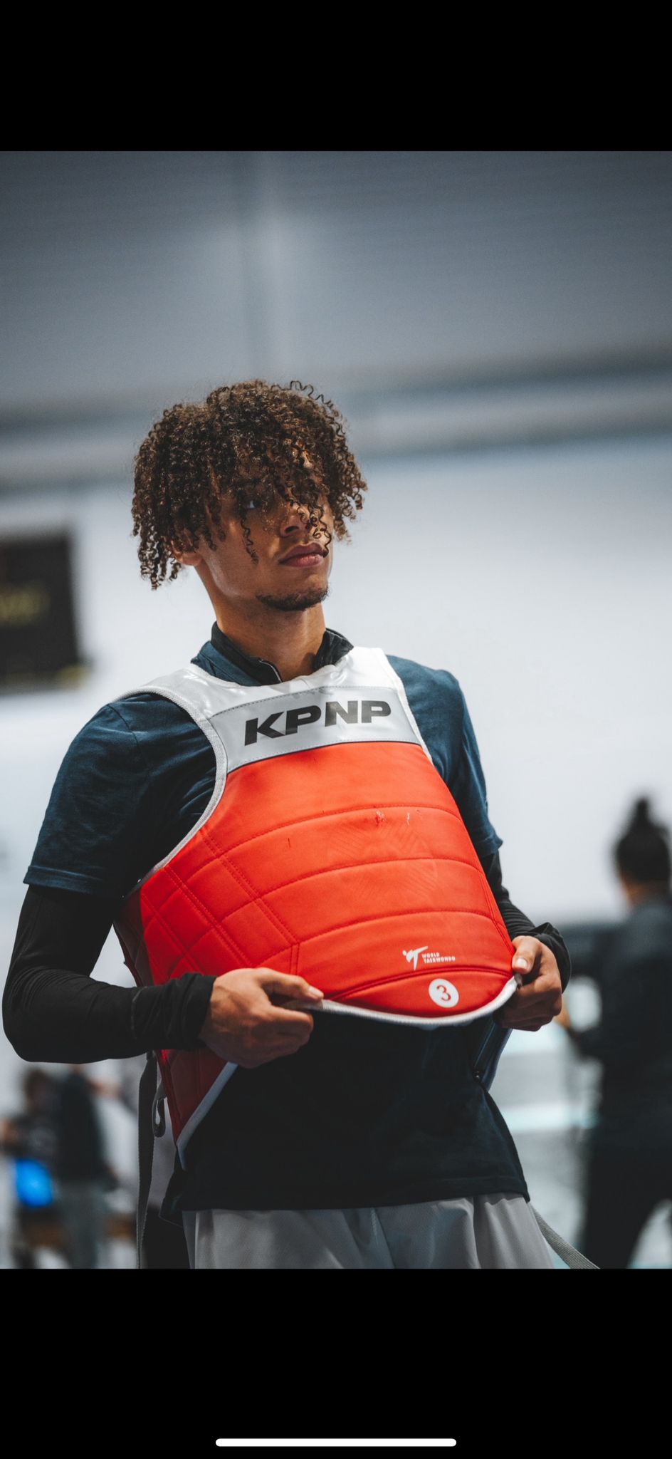 selective focus photography of woman wearing black off-shoulder blouse