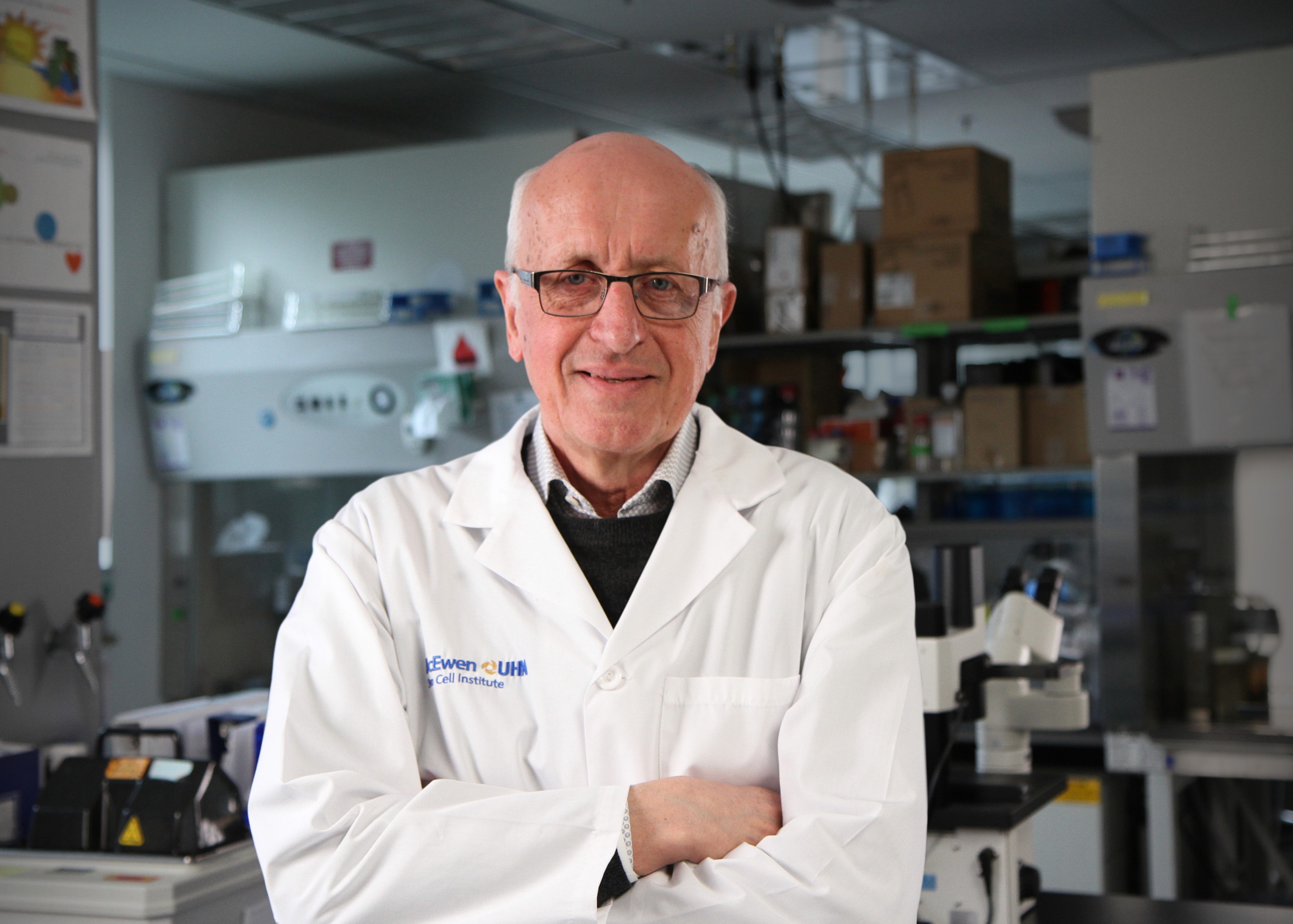 An orange cube-shaped side table is shown.