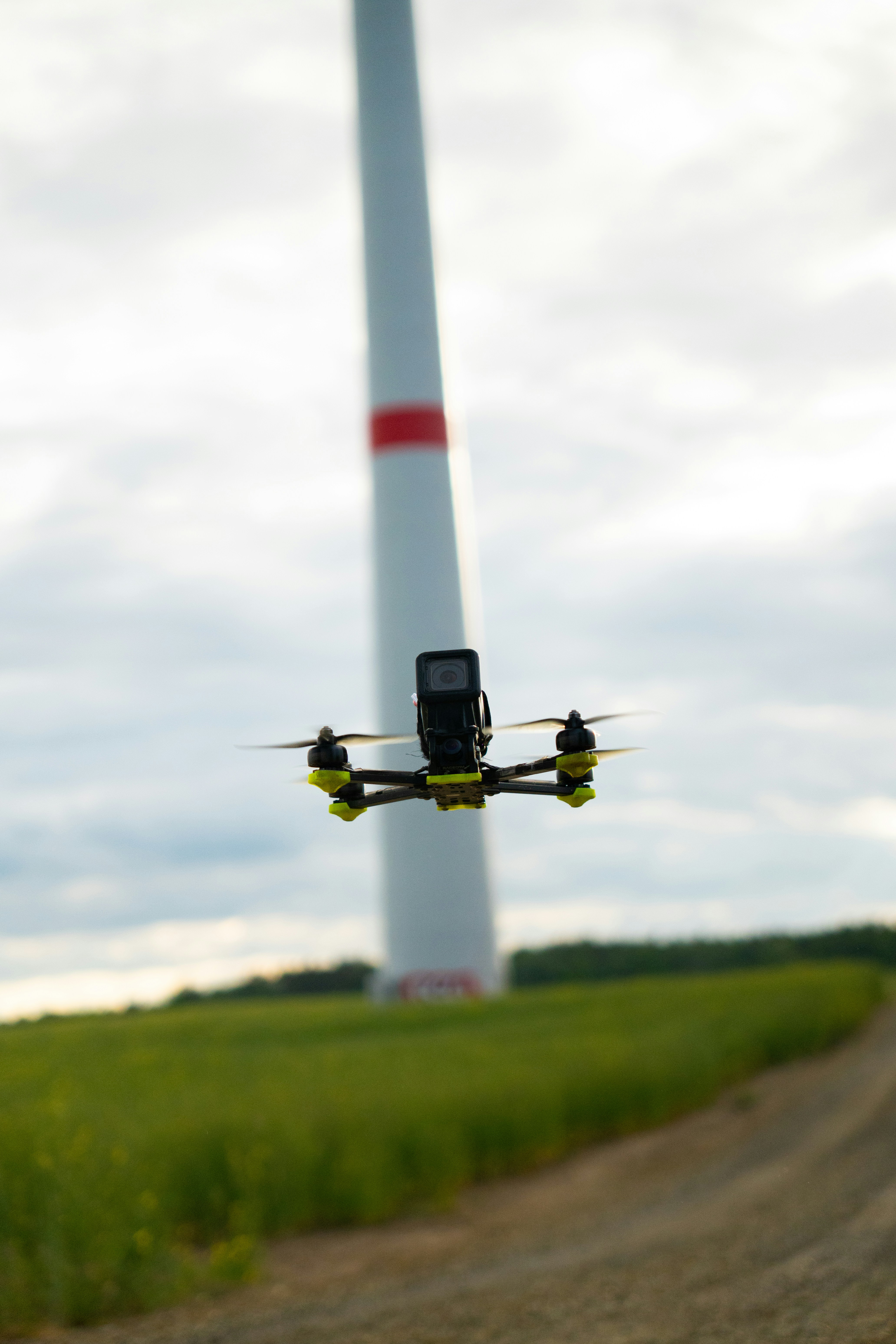 Drone flying near a wind turbine