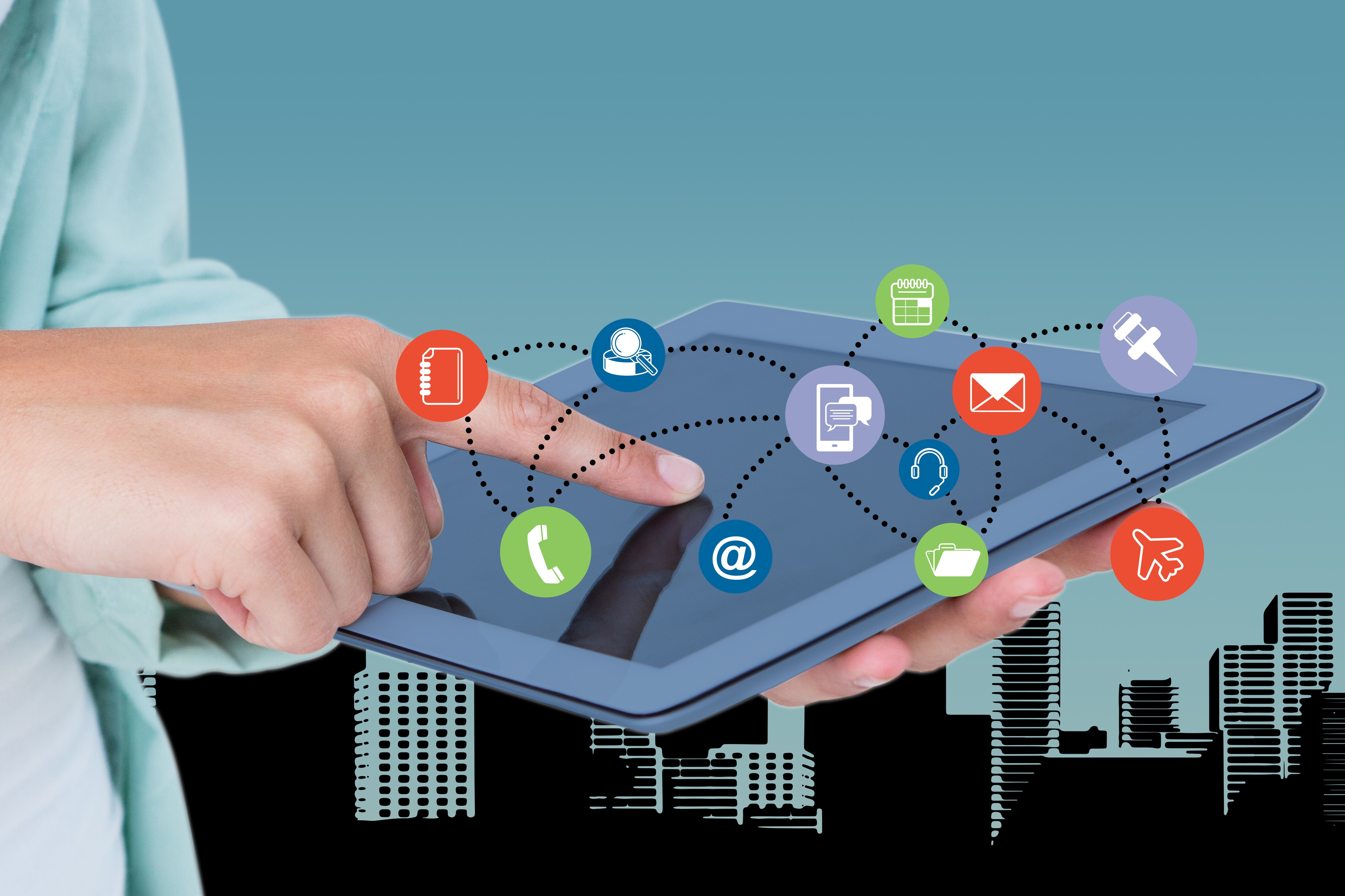 Finger pointing at a tablet screen 