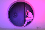 woman standing infront of a vault (Photo by Mikhail Nilov)