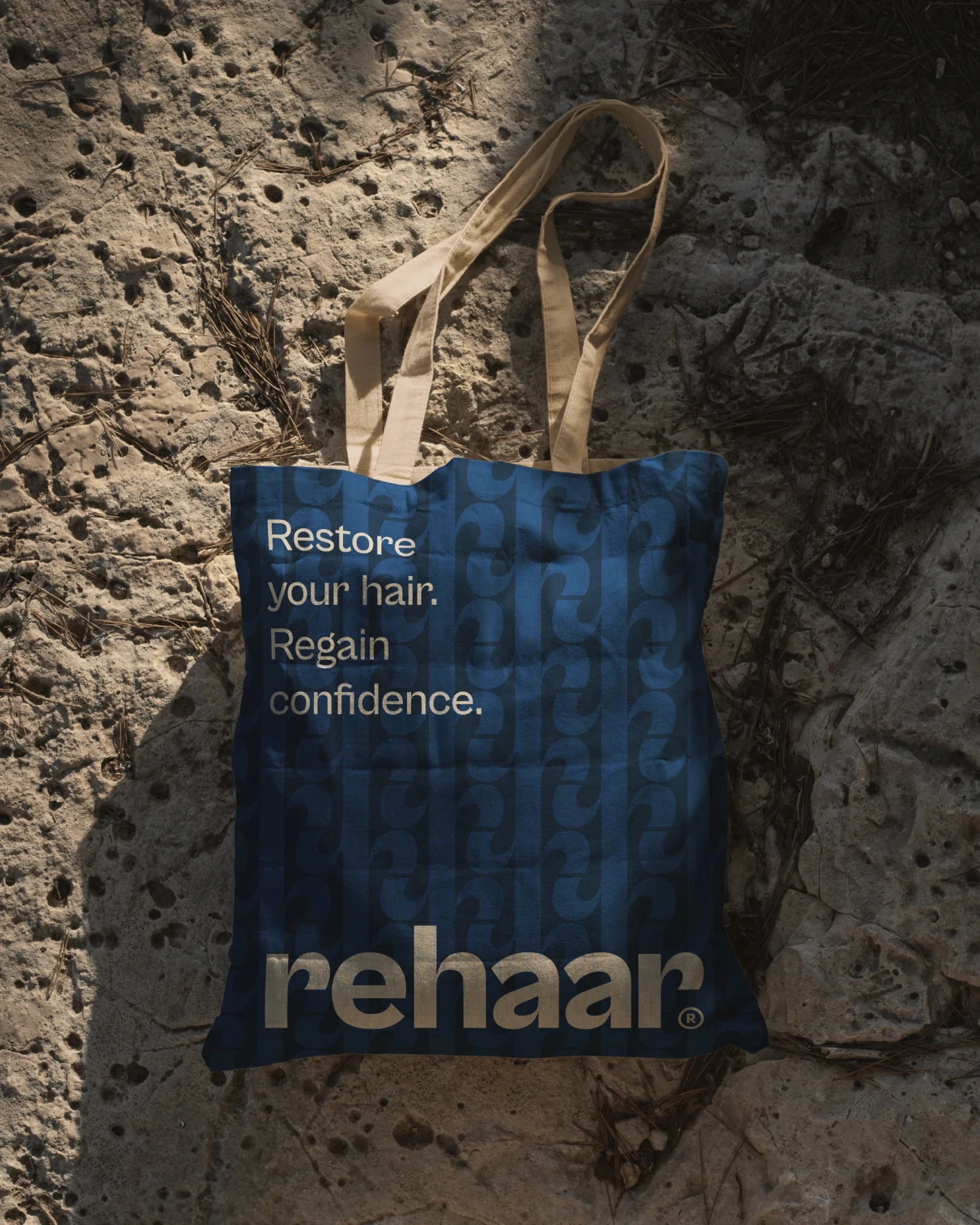Blue tote bag on stones undergound