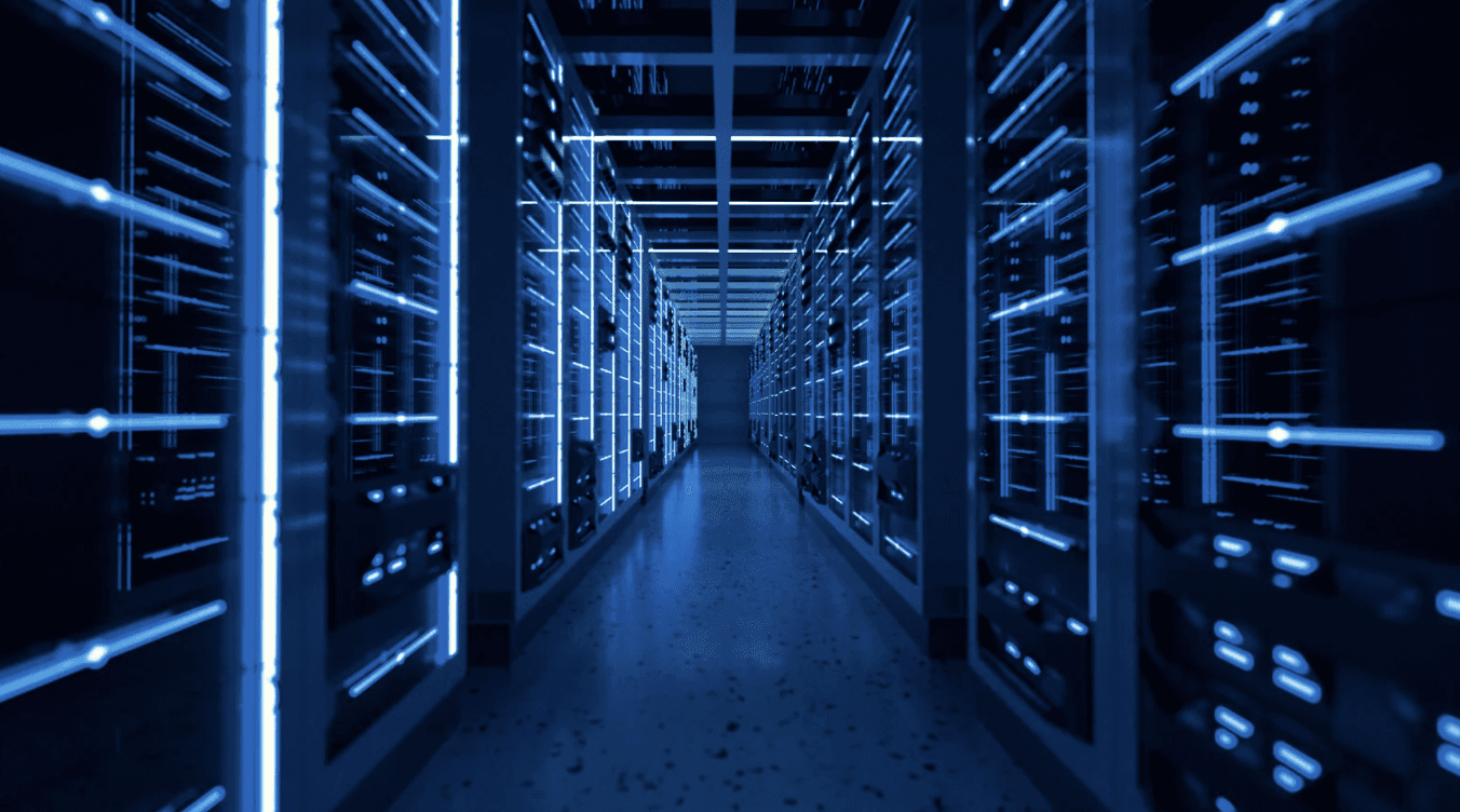 blue lit up room full of servers