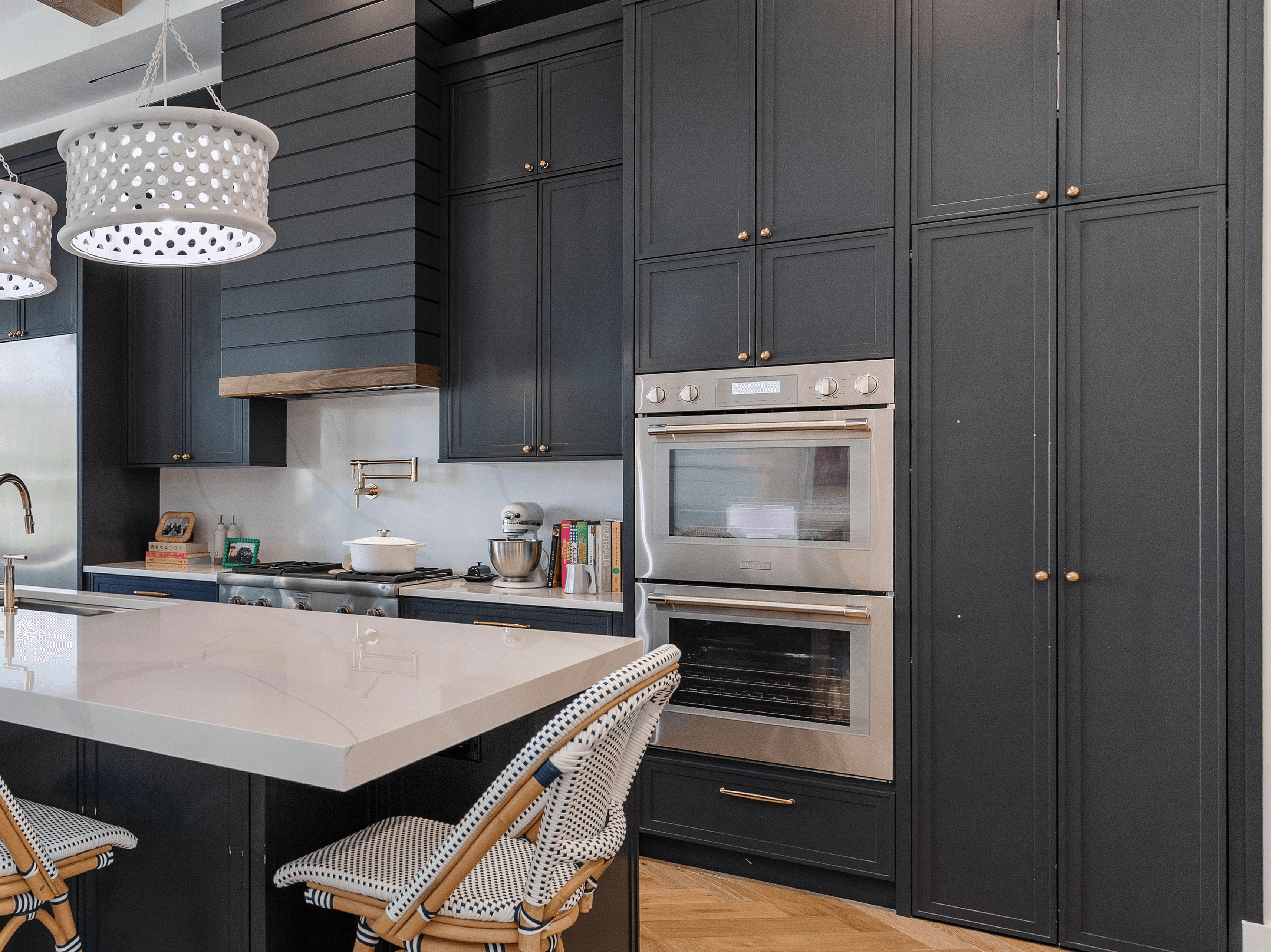 a living room with a couch, chair and table