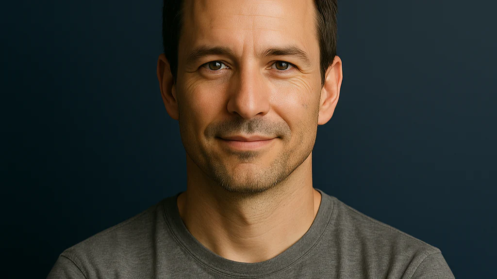 Woman holding a smartphone looking through the glass