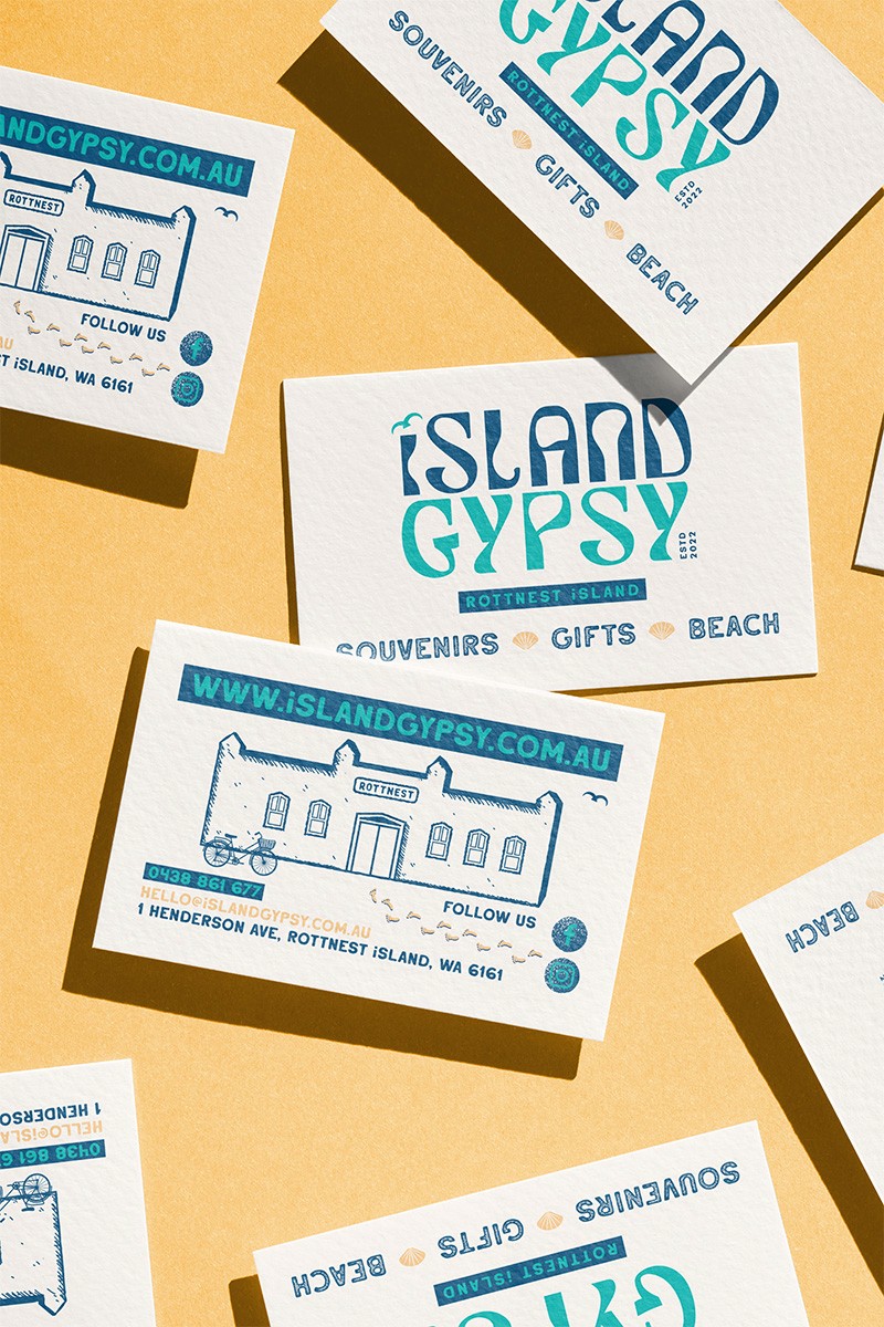 Cluster of translucent pink glass pendant spheres hanging on white—modern lighting décor.