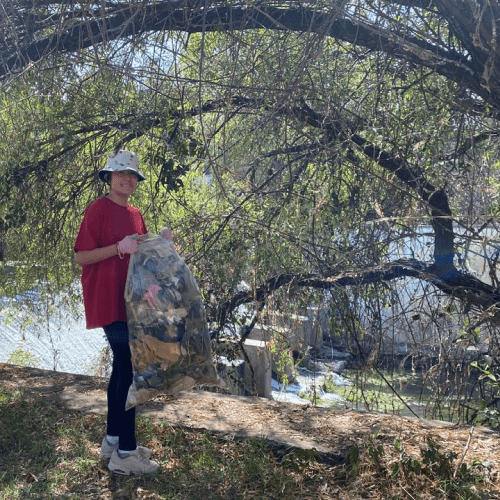 Judith Puente Cavazos participating in environmental cleanup