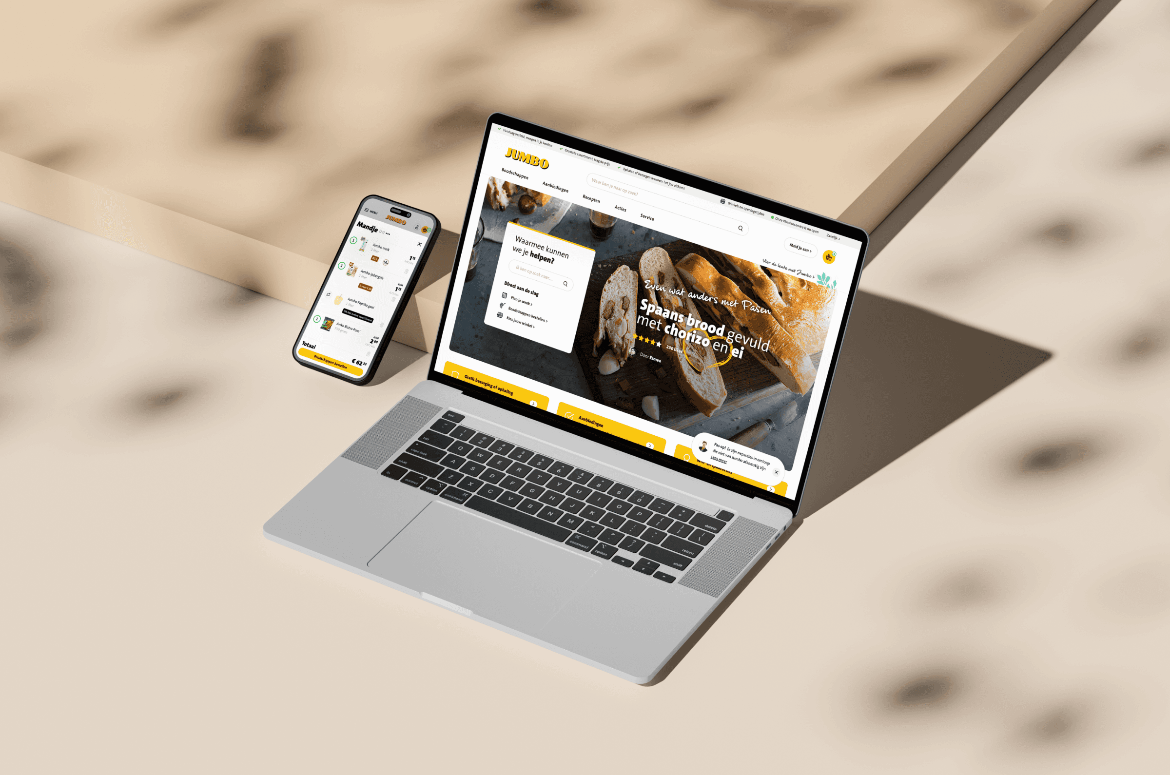 A mockup of laptop and mobile phone with Jumbo redesign