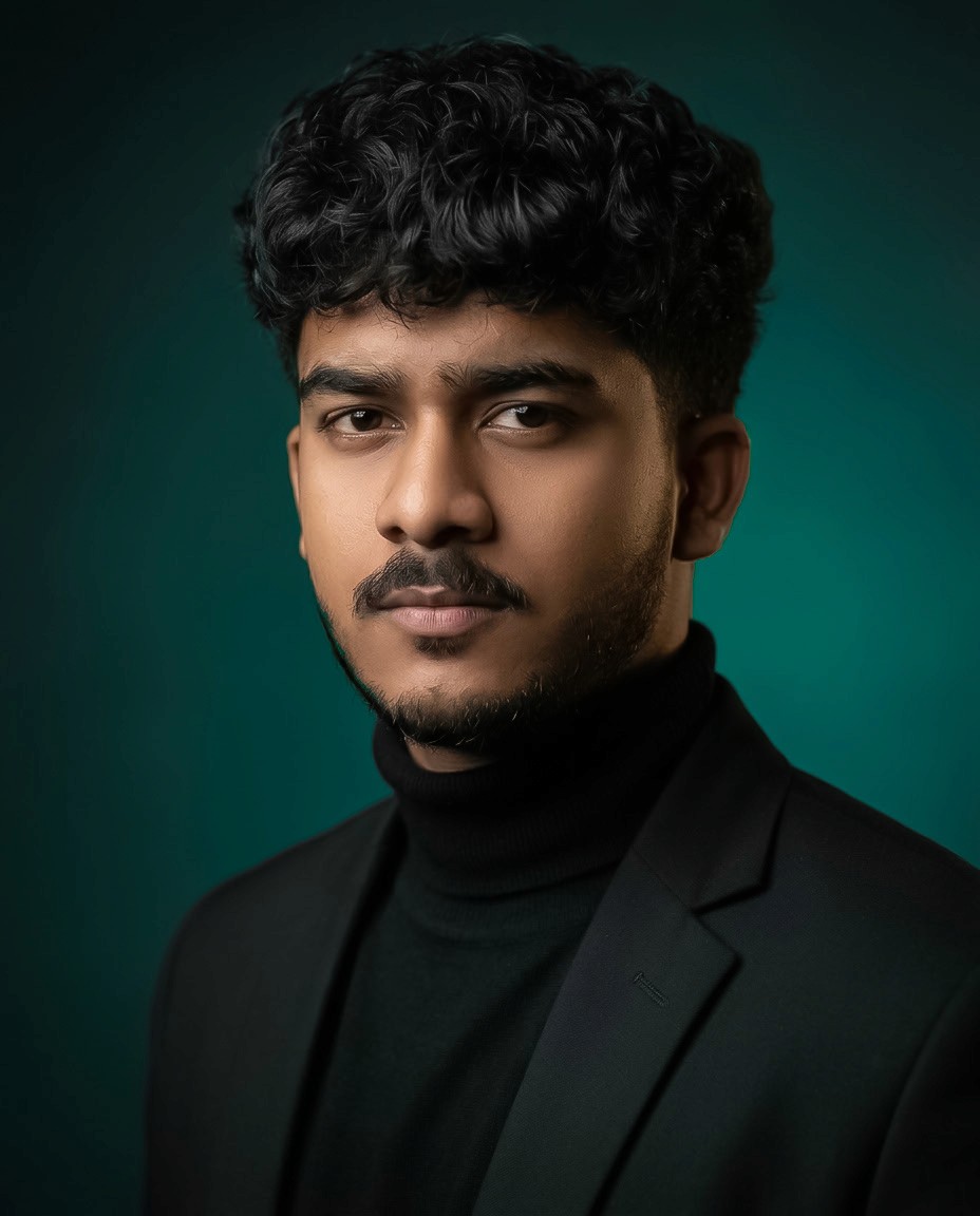 man in black hoodie standing