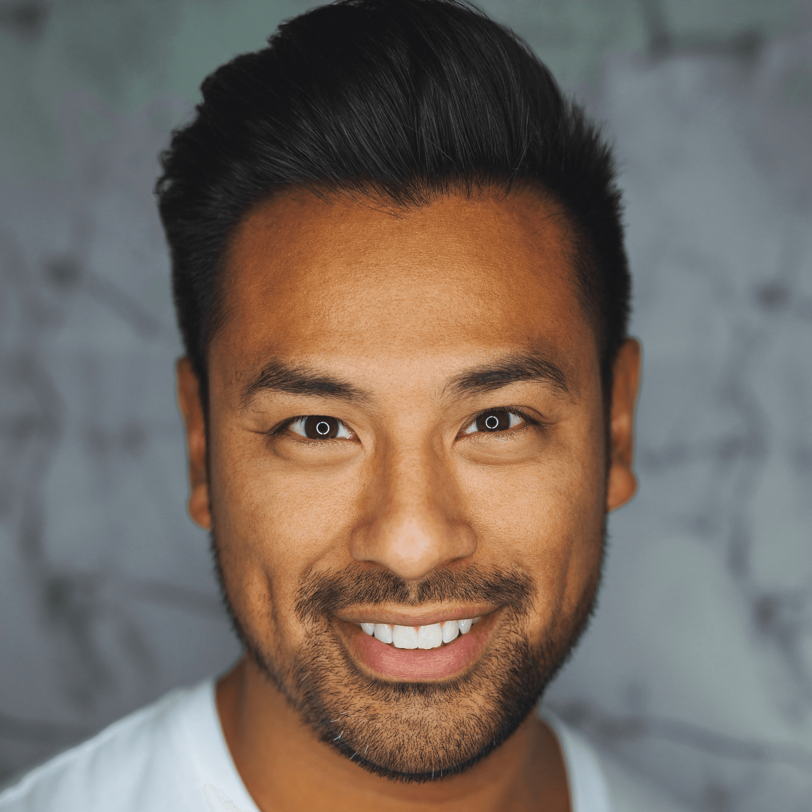 man wearing white V-neck shirt