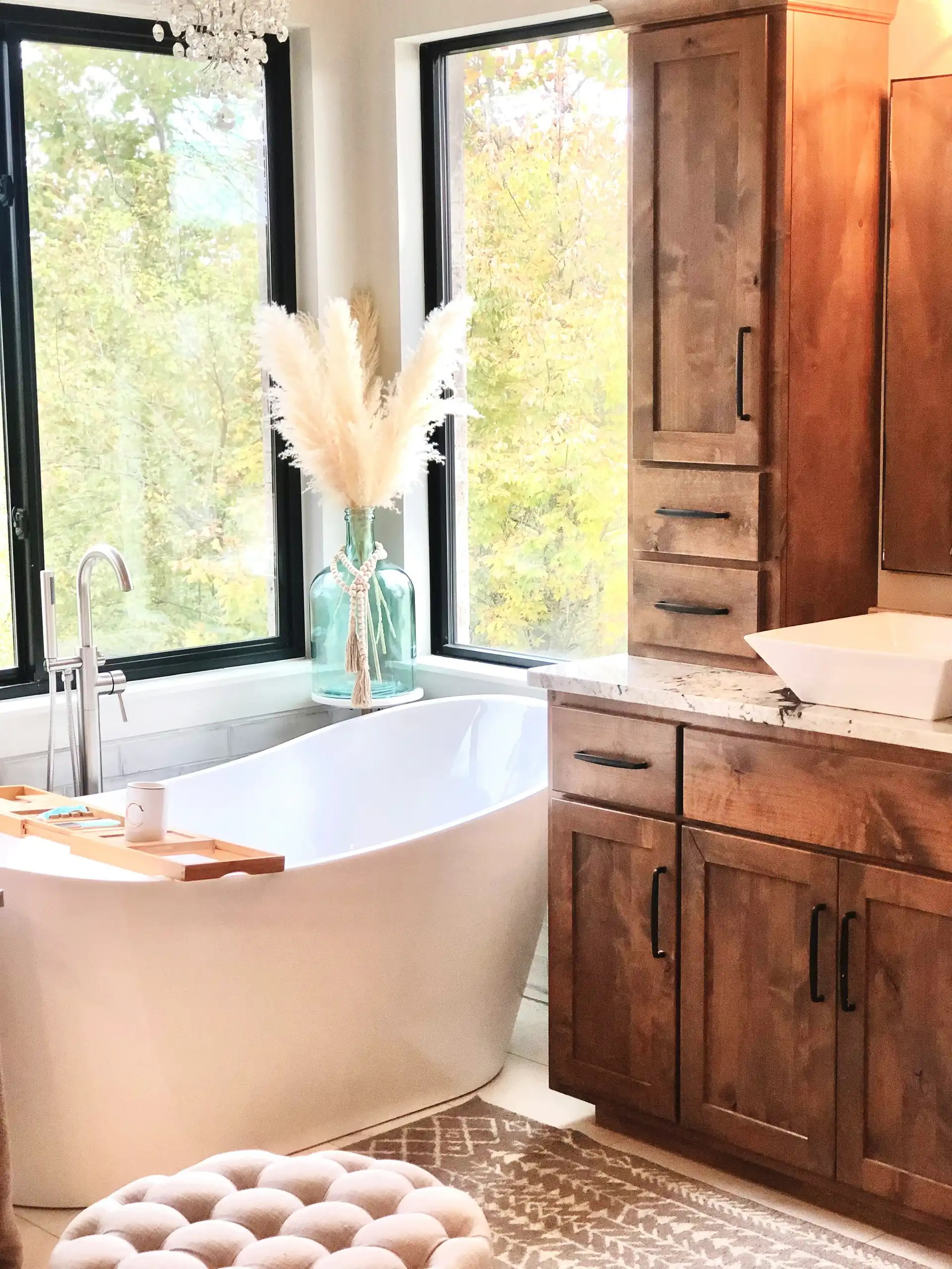 Clean bathroom with a glass shower enclosure, sink, and mirror