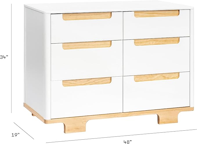 Elegant babyletto yuzu dresser with ample storage space and a timeless design.