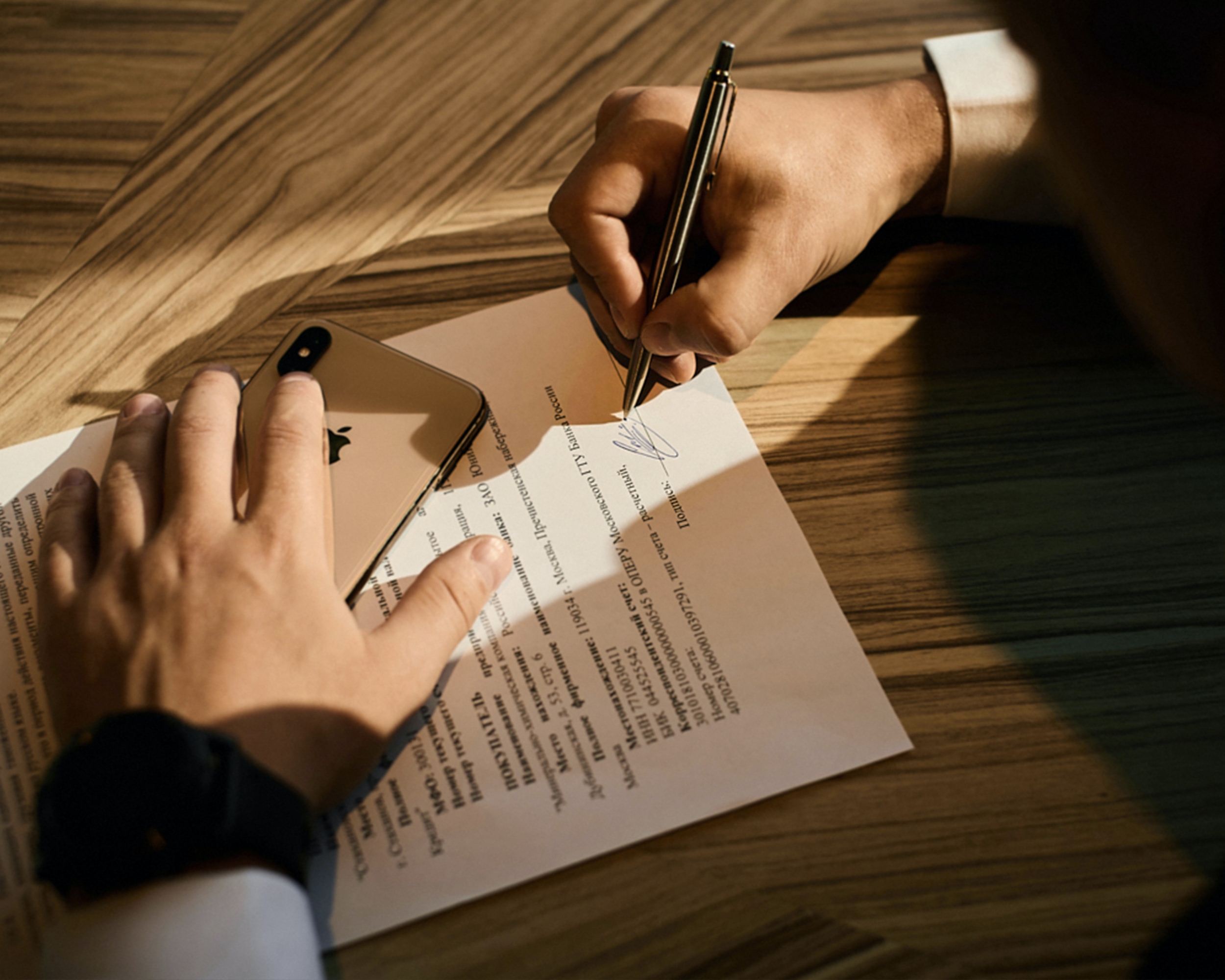 man signing permission document for sampling music copyright