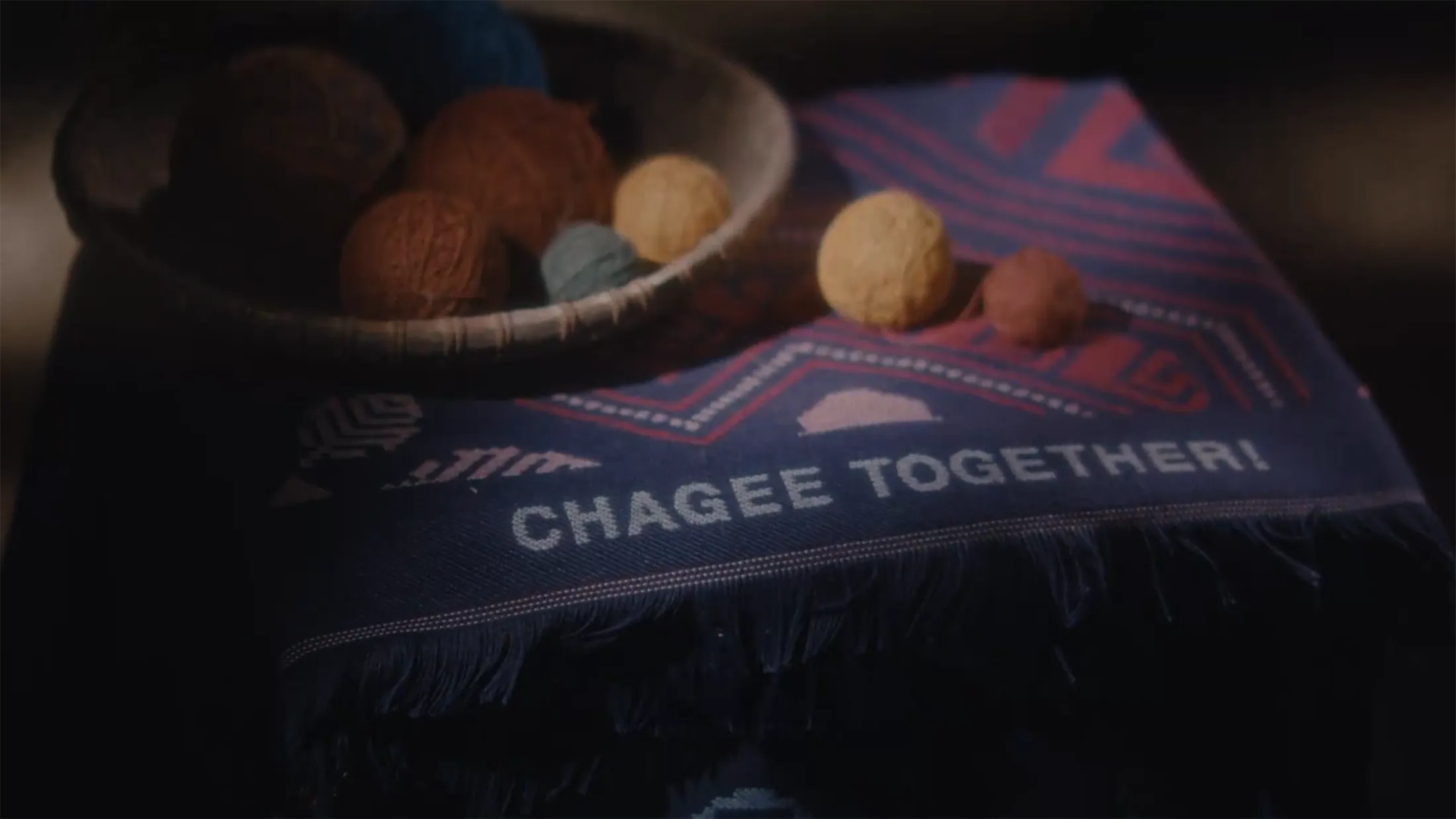 Close-up detail used to connect brand identity with regional craft and cultural references.