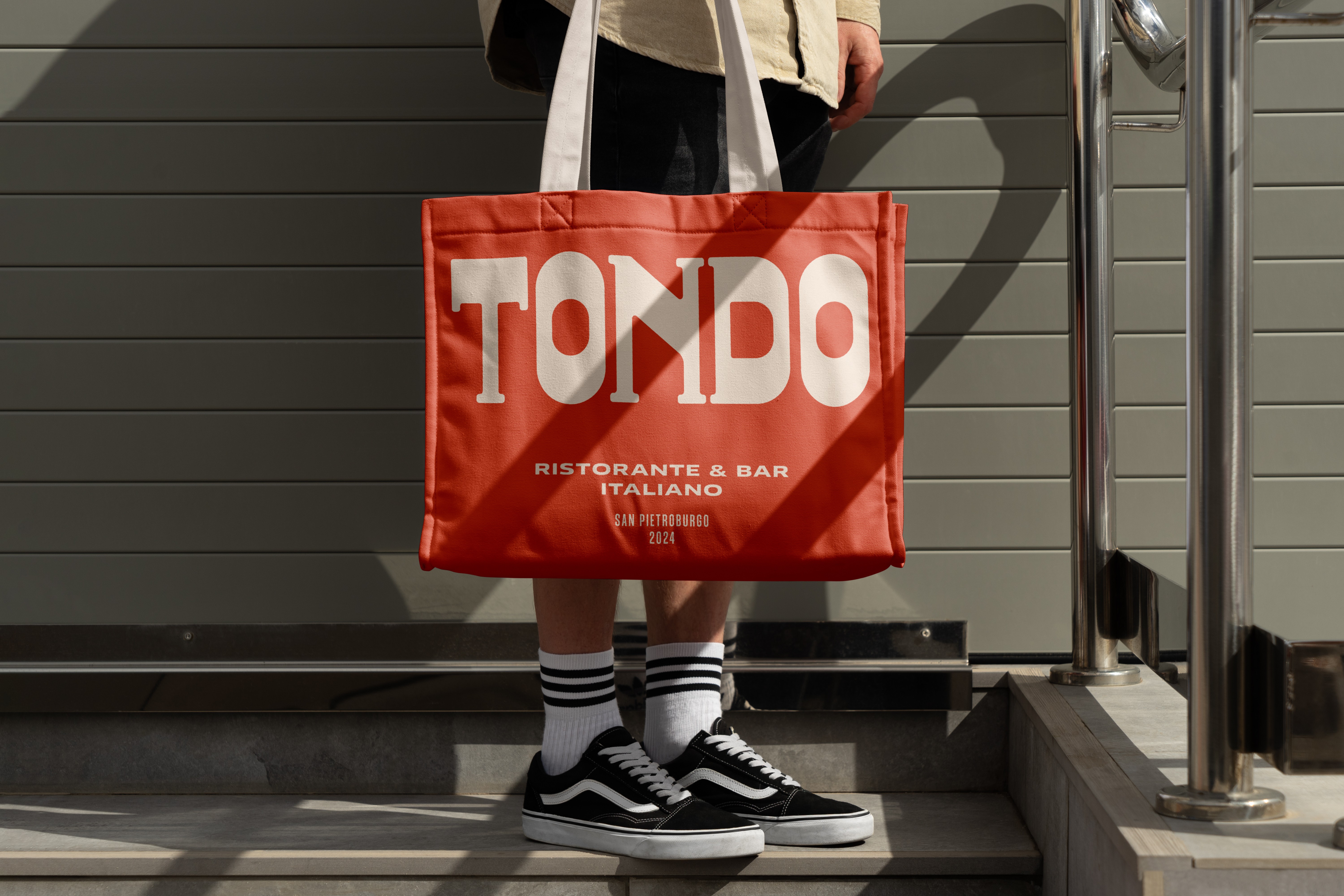 Streetside billboard with flyposters of the Batch.Works brand and illustrations
