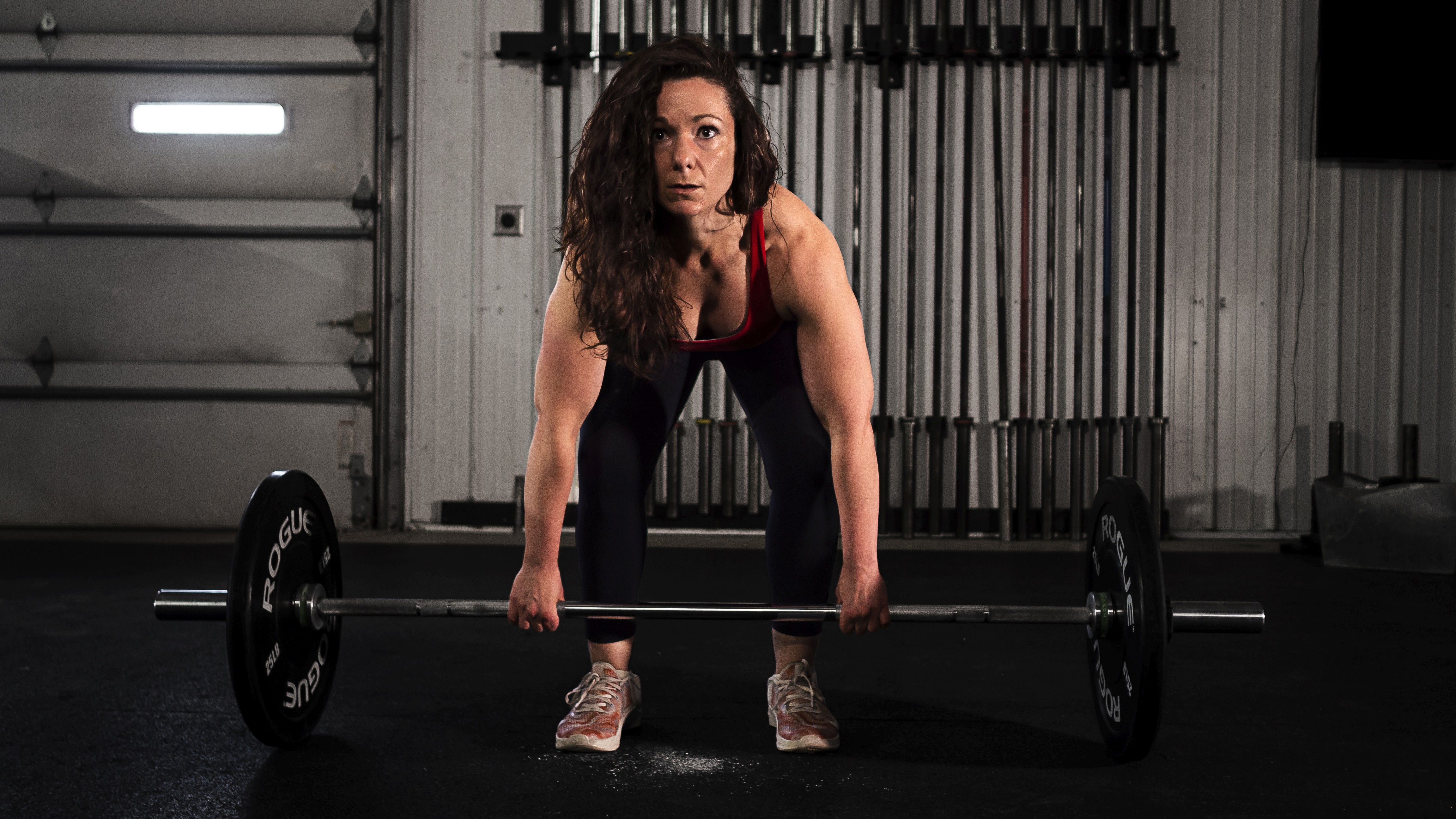 Katrina Howard performing a deadlift during strength training