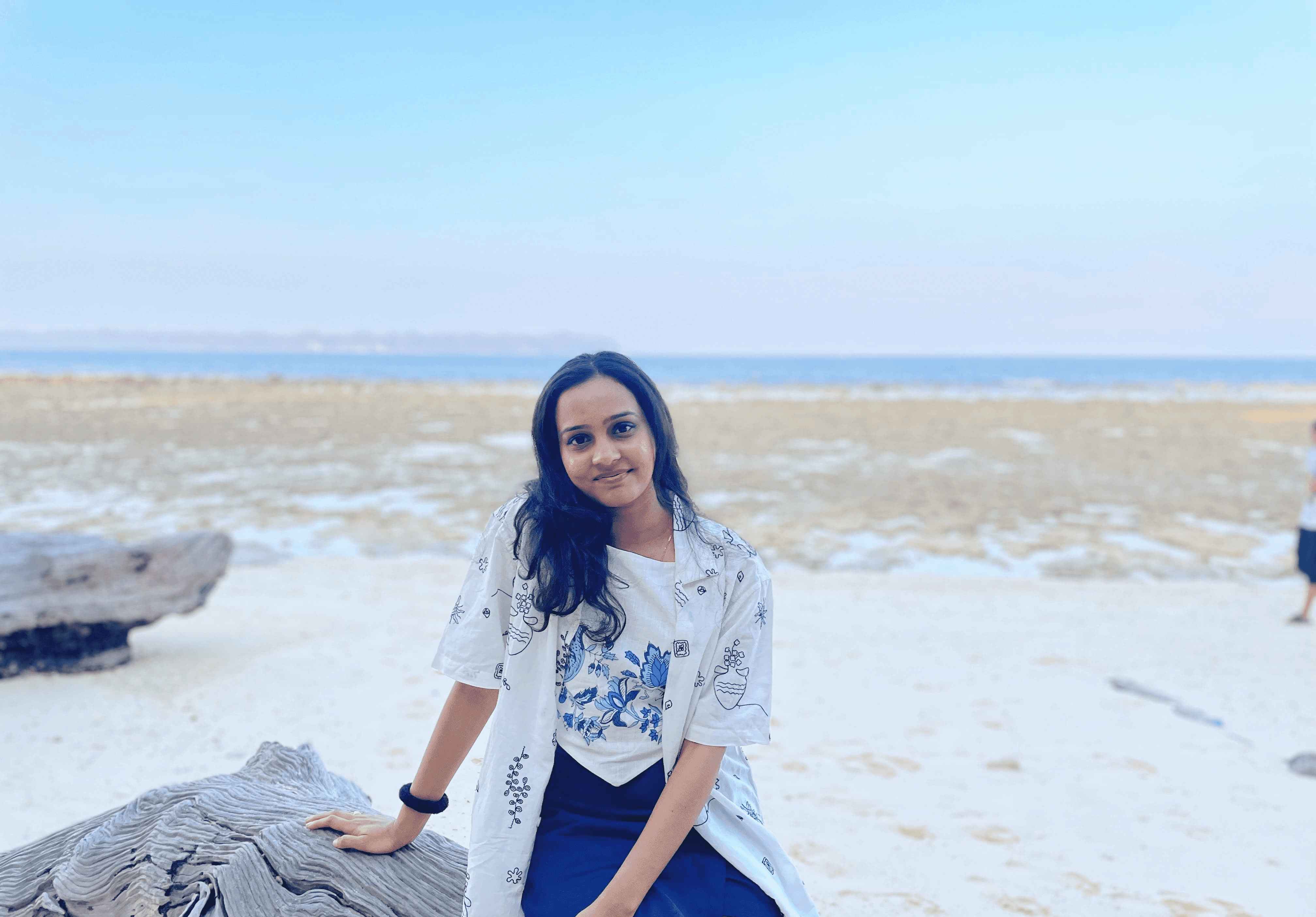 A young girl smiling