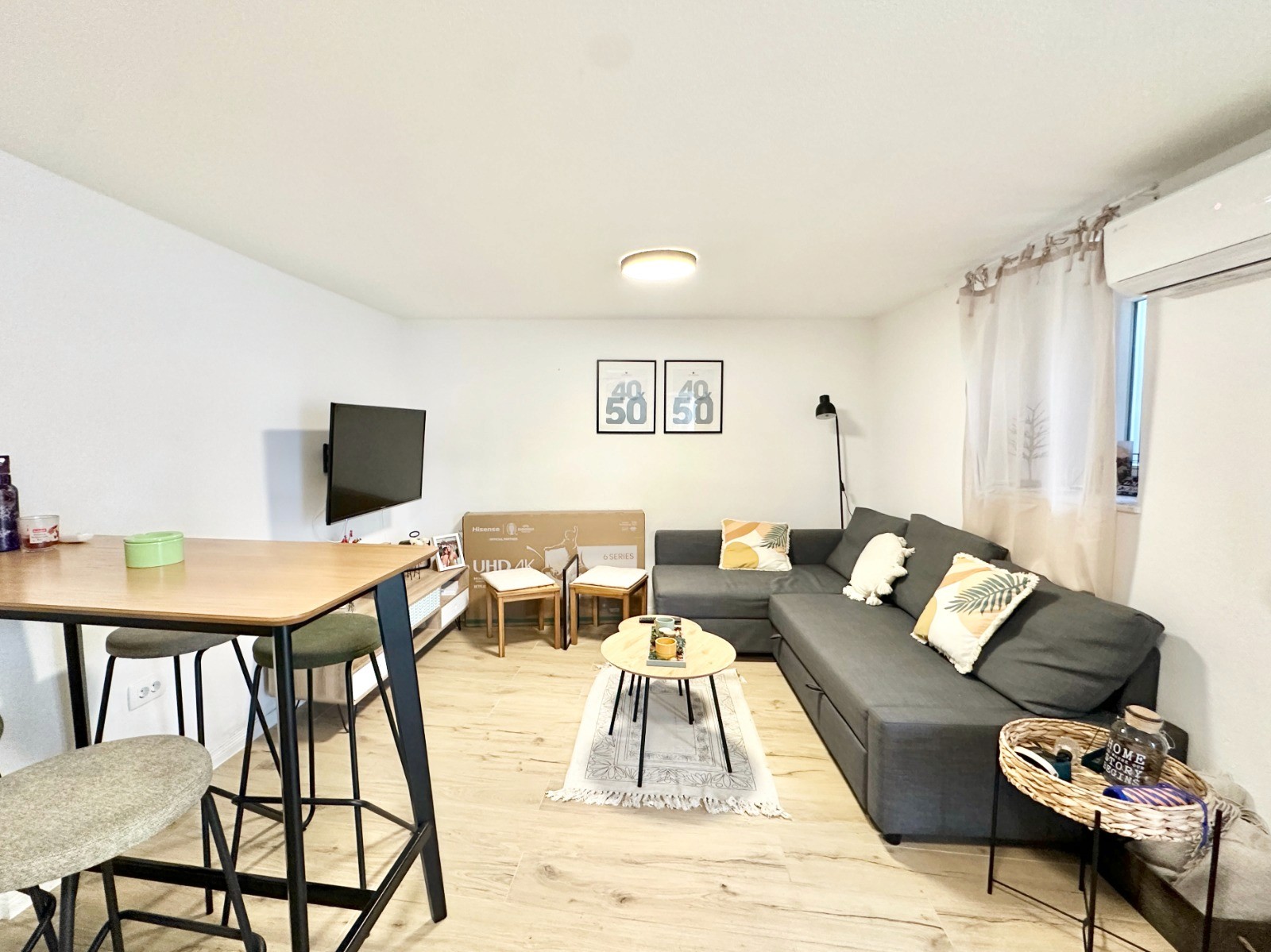 Ornate classic bathroom with claw-foot tub and wood paneling.