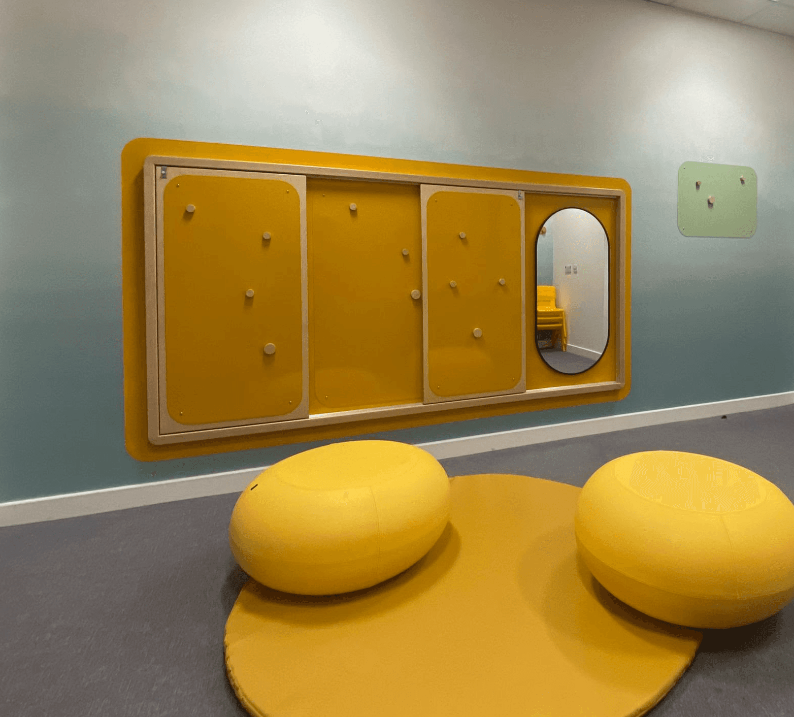 Bright coloured contemporary interactive furniture design and interior fit out for hospital and therapy space