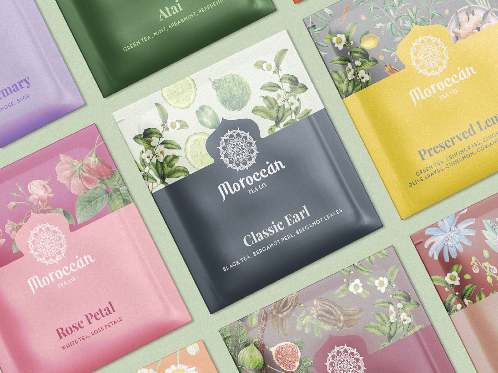 Flatlay arrangement of colorful skincare product packages in pastel pink, blue, and black, showcasing a beauty brand collection.