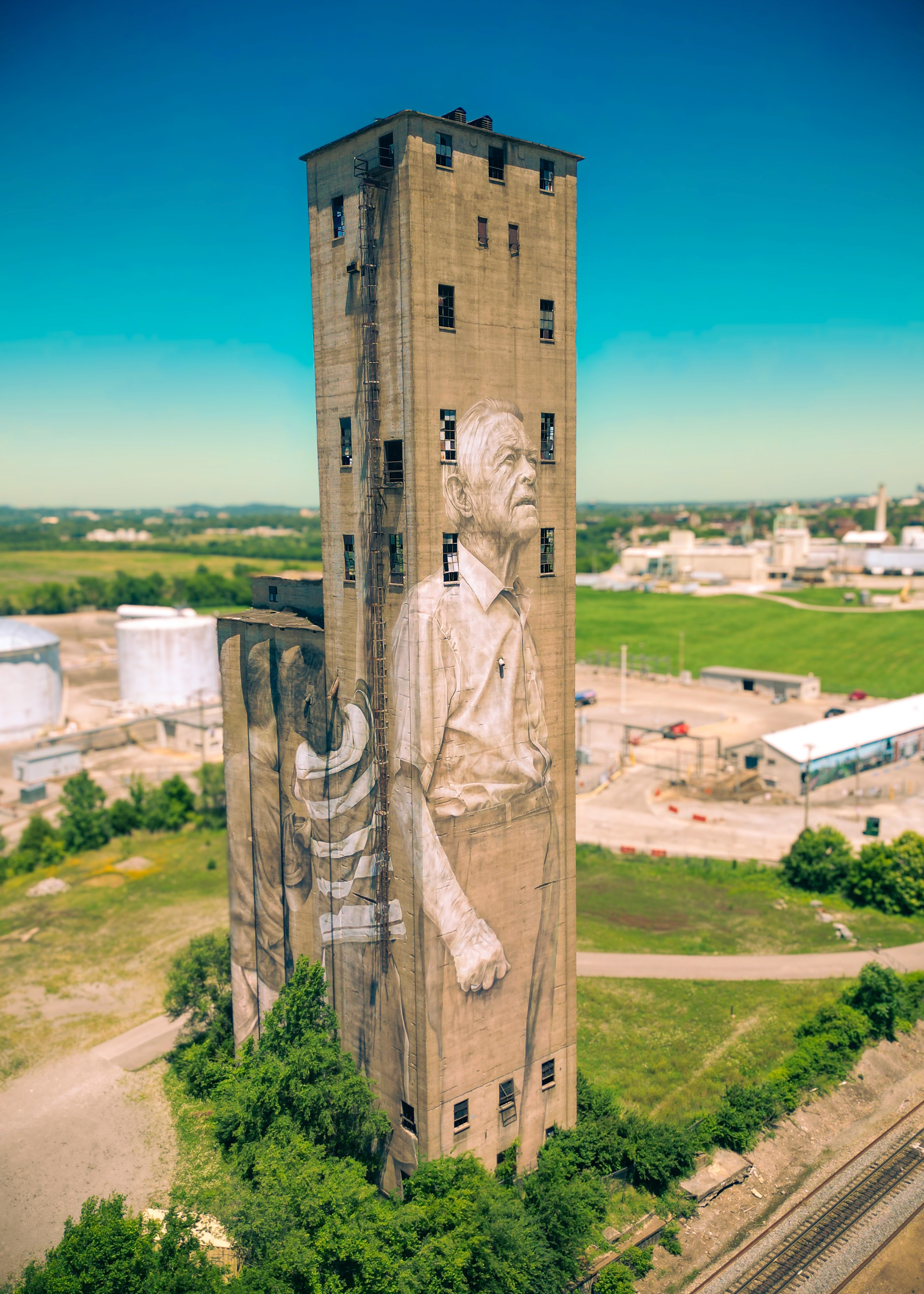 Large-scale mural on the Nations Silo in Nashville, TN, illustrating structural brand authority and visual architecture.
