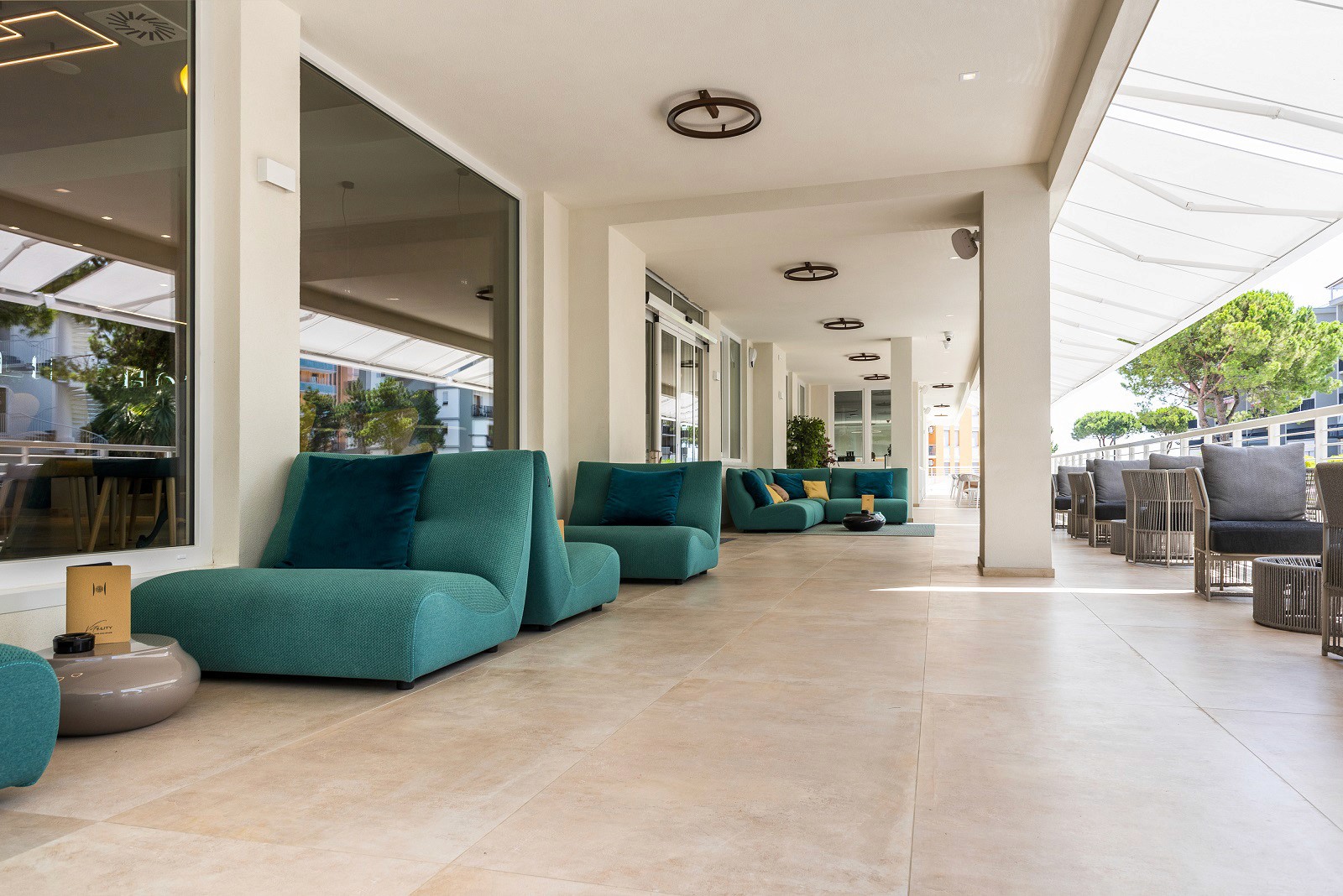 A smiling woman throwing a basketball