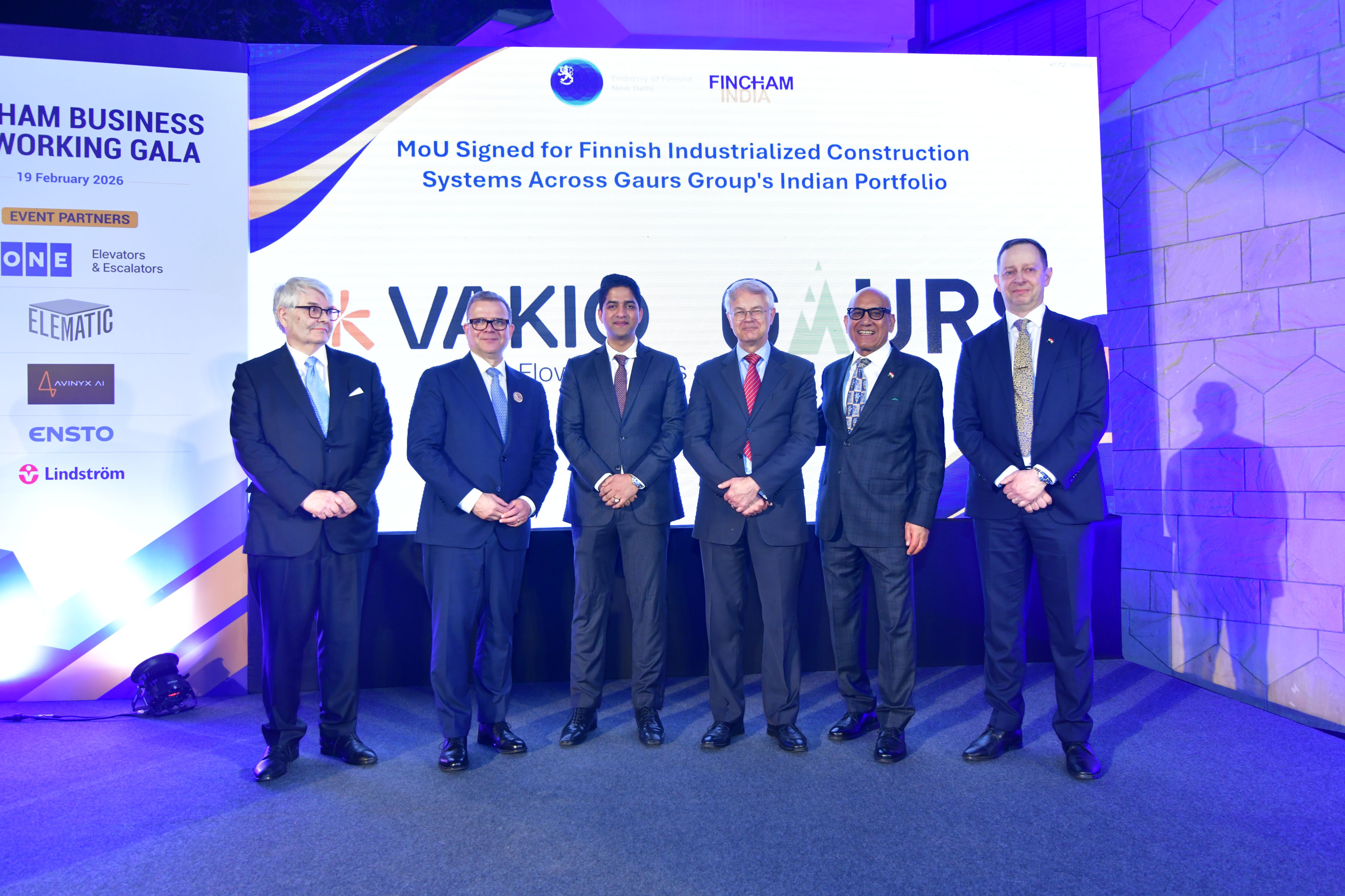 A picture of the companies' representatives on stage with Finland's Prime Minister Orpo and the Ambassador of Finland.