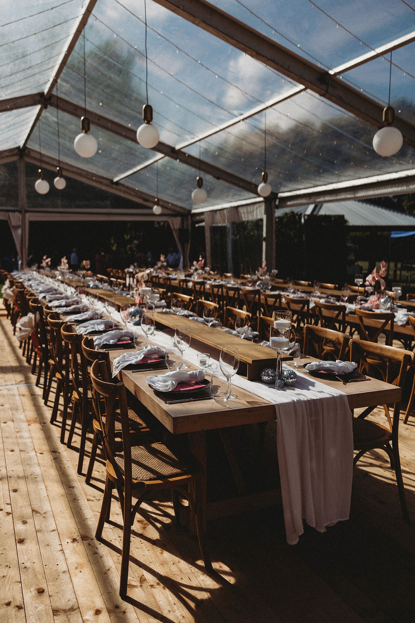Plates and and cutlery for a table setting at a premium wedding