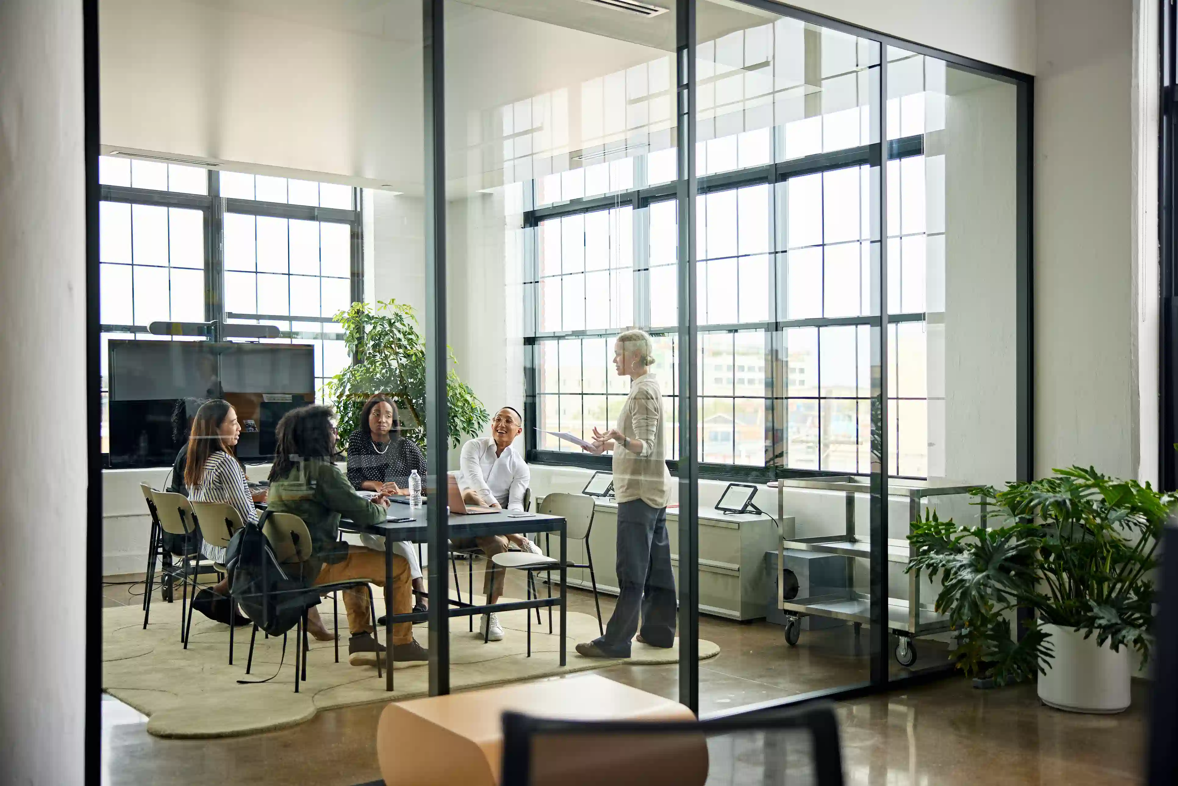 Office environment with greenery and open spaces.