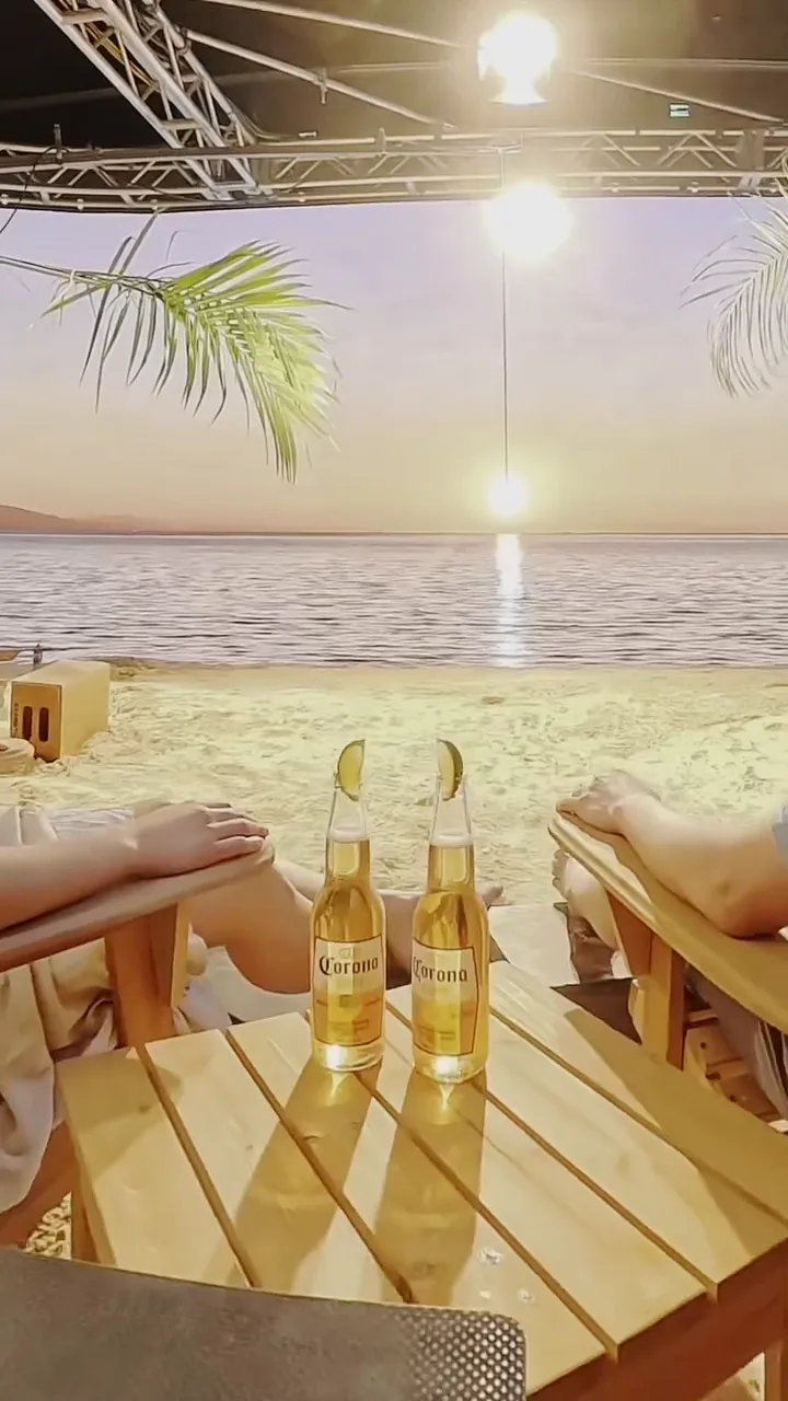 Behind the scenes image of a video shoot for Corona Light. 